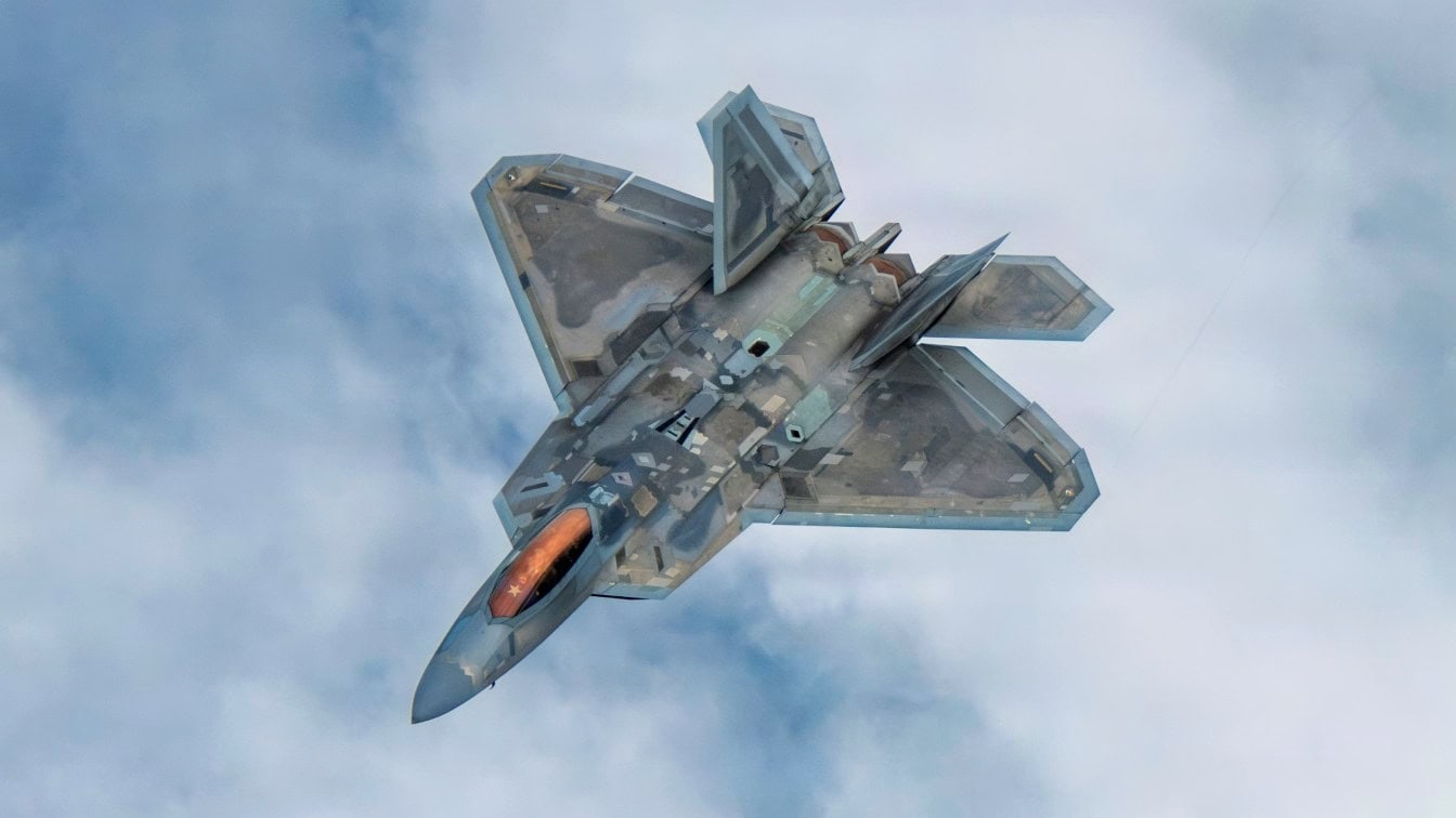 A U.S. Air Force F-22 Raptor assigned to the 154th Wing, Hawaii Air National Guard, takes part in a multi-ship formation off the coast of Hawaii, Jan. 5, 2026. The aircraft participated in a comprehensive training sortie designed to integrate the 154th Operations Group’s distinct mission sets, including air superiority and aerial refueling, to ensure peak mission readiness in the Indo-Pacific theater. (U.S. Air National Guard photo by Senior Master Sgt. Mysti Bicoy)