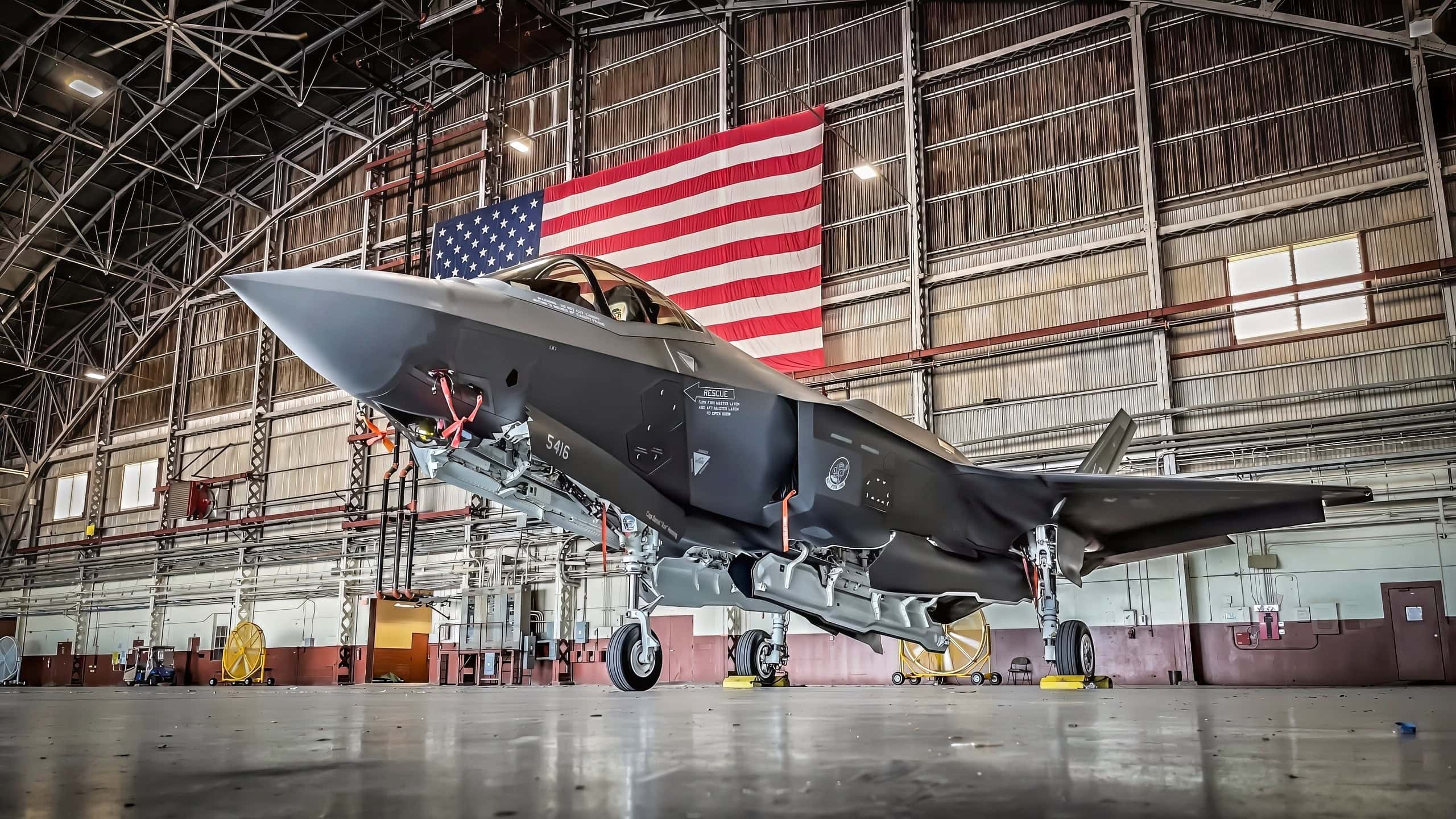 An F-35 Lightning II assigned to the 62nd Fighter Squadron, Luke Air Force Base, Ariz., sits in a hangar ahead of operations for the F-35 Lightning II TDY, Oct. 28, 2021, at Joint Base San Antonio-Kelly Field, Texas. The 62nd FS will be training with F-16s from the 149th Fighter Wing and the 301st Fighter Wing, along with T-38s from the 301st Fighter Wing. The multi-role capabilities of the F-35 allows them to perform missions which traditionally required numerous specialized aircraft. The complimentary air superiority capabilities of the F-35 will augment our air superiority fleet and ensure we continue to "own the skies" over future battlefields. (U.S. Air Force photo by Brian G. Rhodes)
