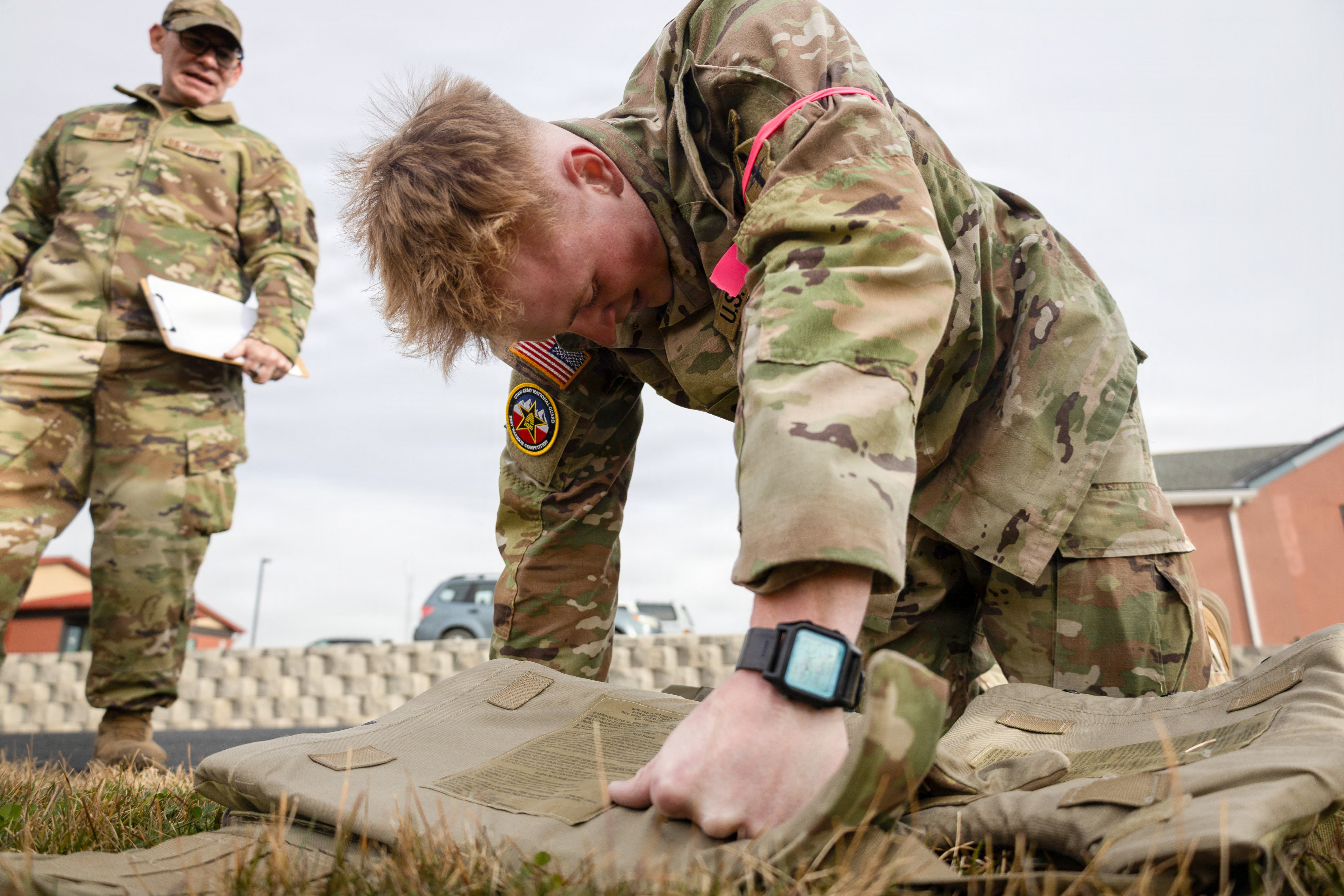 Spc. Kaden Harvey, a combat medic with the 1/19th Special Forces Group (Airborne), recovers after finishing the half-mile portion of the Expert Physical Fitness Assessment at Camp Williams, Utah, March 10, 2026. The Utah National Guard Best Warrior Competition is an annual event that brings together Soldiers and Airmen from the major commands to compete for the title of Soldier/Airman, Noncommissioned Officer, and Senior Noncommissioned Officer-of-the-Year. (U.S. Army National Guard photo by Staff Sgt. Alejandro Lucero)