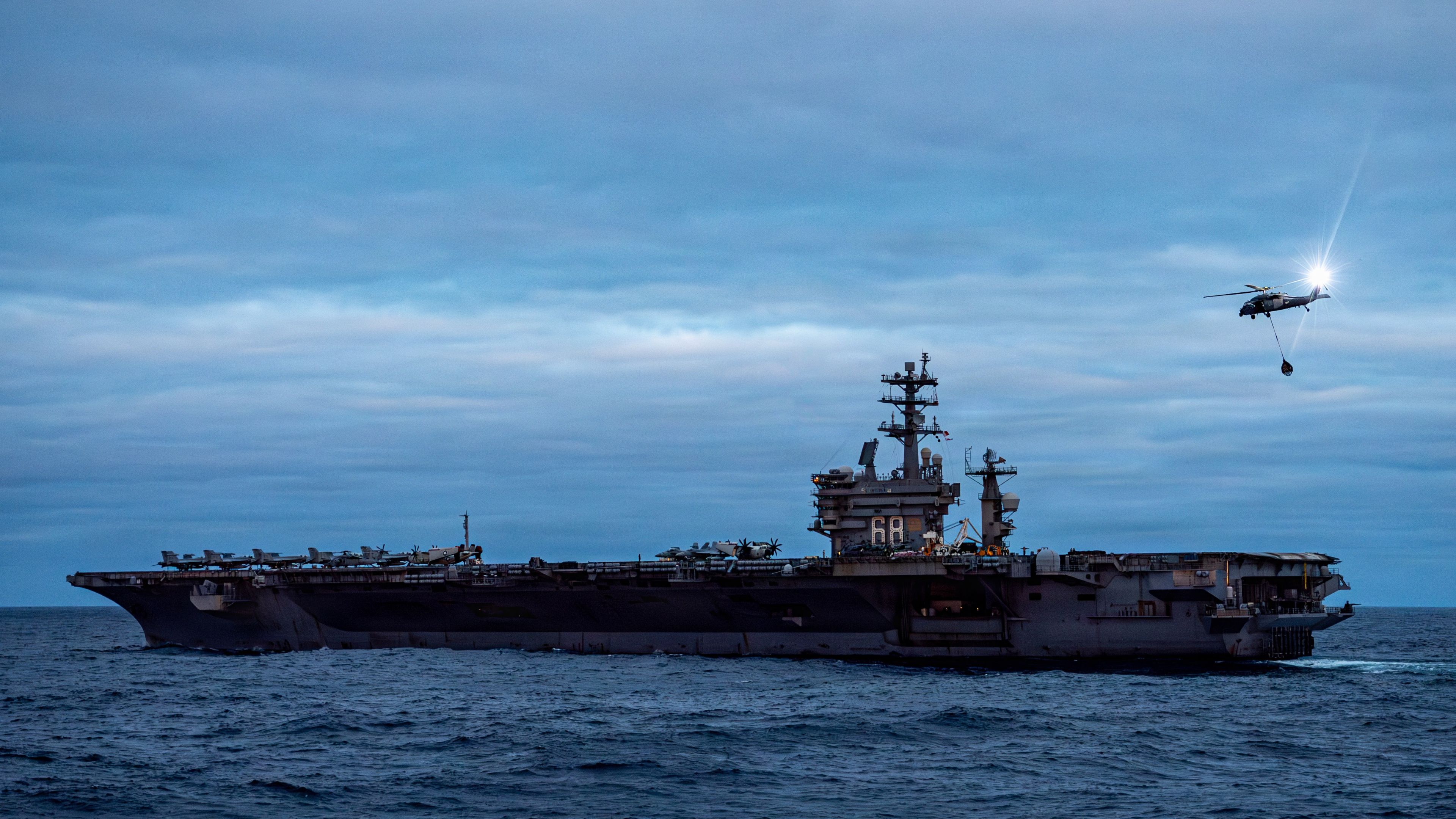 An MH-60S Sea Hawk, attached to Helicopter Sea Combat Squadron 6, conducts a vertical replenishment with the Nimitz-class aircraft carrier USS Nimitz (CVN 68) in the Pacific Ocean, April 23, 2026. Gridley is deployed with Nimitz Carrier Strike Group as part of Southern Seas 2026 which seeks to enhance capability, improve interoperability, and strengthen maritime partnerships with countries throughout the region through joint, multinational and interagency exchanges and cooperation. (U.S. Navy photo by Mass Communication Specialist 2nd Class Timothy Meyer)