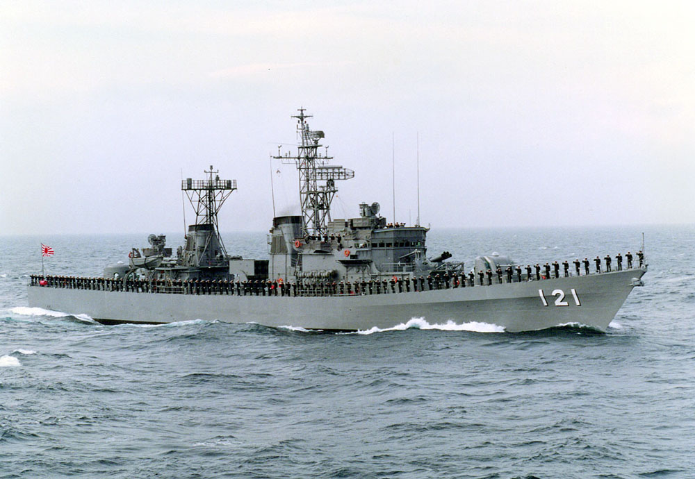 Japan Maritime Self-Defense Force destroyer with crew lining the rails