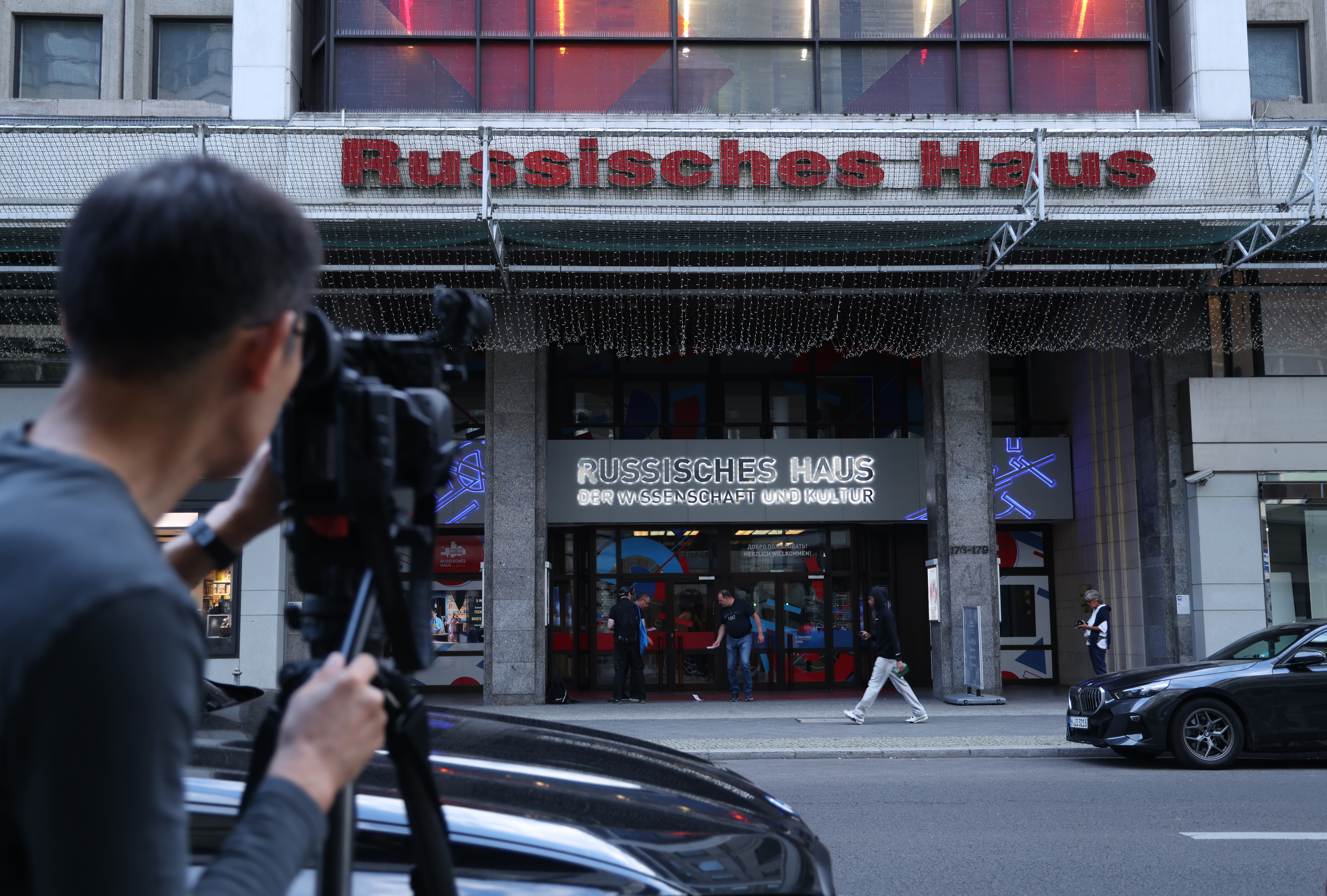 A television reporter films the Russian House of Science and Culture in Berlin on Sept. 1, 2026, shortly after authorities announced Germany's response to a failed drone attack in August at Leipzig airport. (Sean Gallup/Getty Images)
