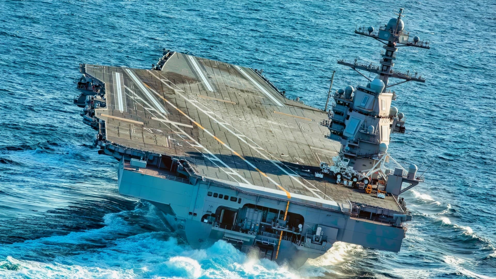 Ford-class aircraft carrier high-speed turn during sea trials