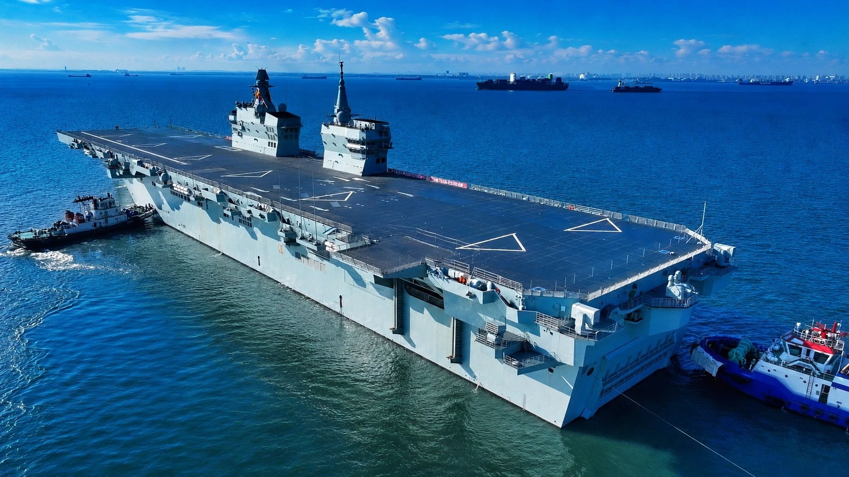 Chinese Type 076 drone carrier at sea representing naval shipbuilding expansion