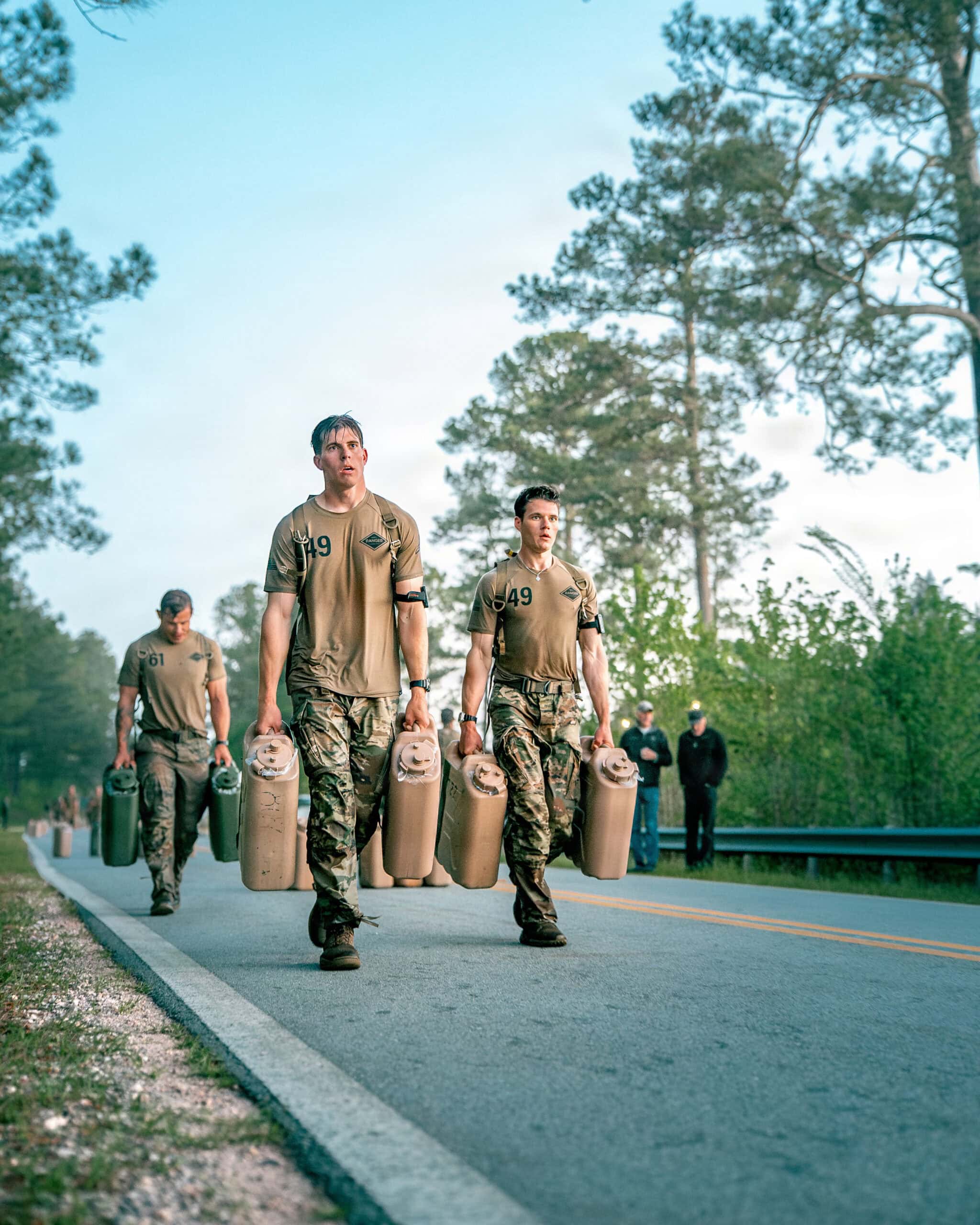 U.S. Army Spc. Caleb Godbold and Sgt. Drew Schorsch (Team 49), assigned to the 75th Ranger Regiment, running during the water carry event during the 42nd David E. Grange, Jr. Best Ranger Competition on Fort Benning, Georgia, April 10, 2026. The Best Ranger Competition, also unofficially known as the “Army Olympics”, is a grueling three-day event that pushes the Army’s toughest two-man teams to their absolute physical and mental limits in the ultimate test of endurance, skill, and true grit. (U.S. Army photo by Spc. Luke Sullivan)
