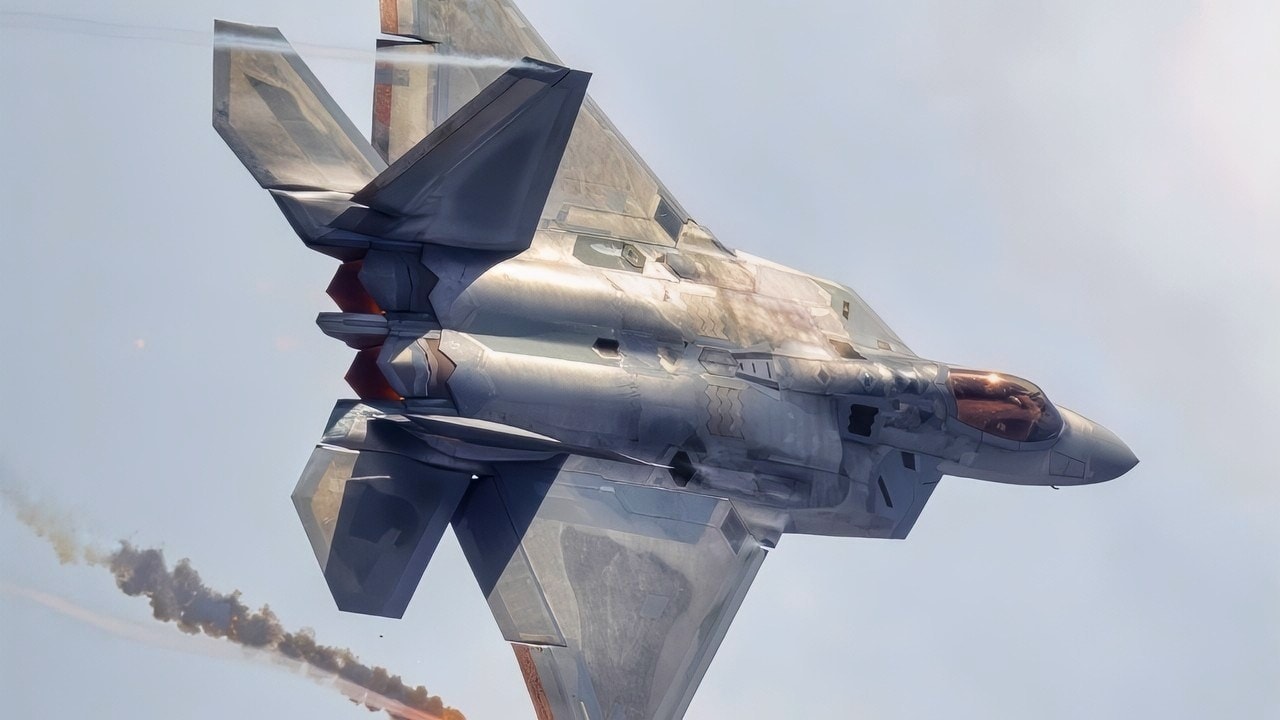 An F-22 Raptor releases flares during an aerial demonstration at Naval Air Station Oceana, Virginia, Sept. 21, 2025. The display highlights the aircraft’s defensive systems and advanced capabilities, demonstrating both its agility and readiness in complex flight operations. (U.S. Air Force photo by Staff Sgt. Lauren Cobin)