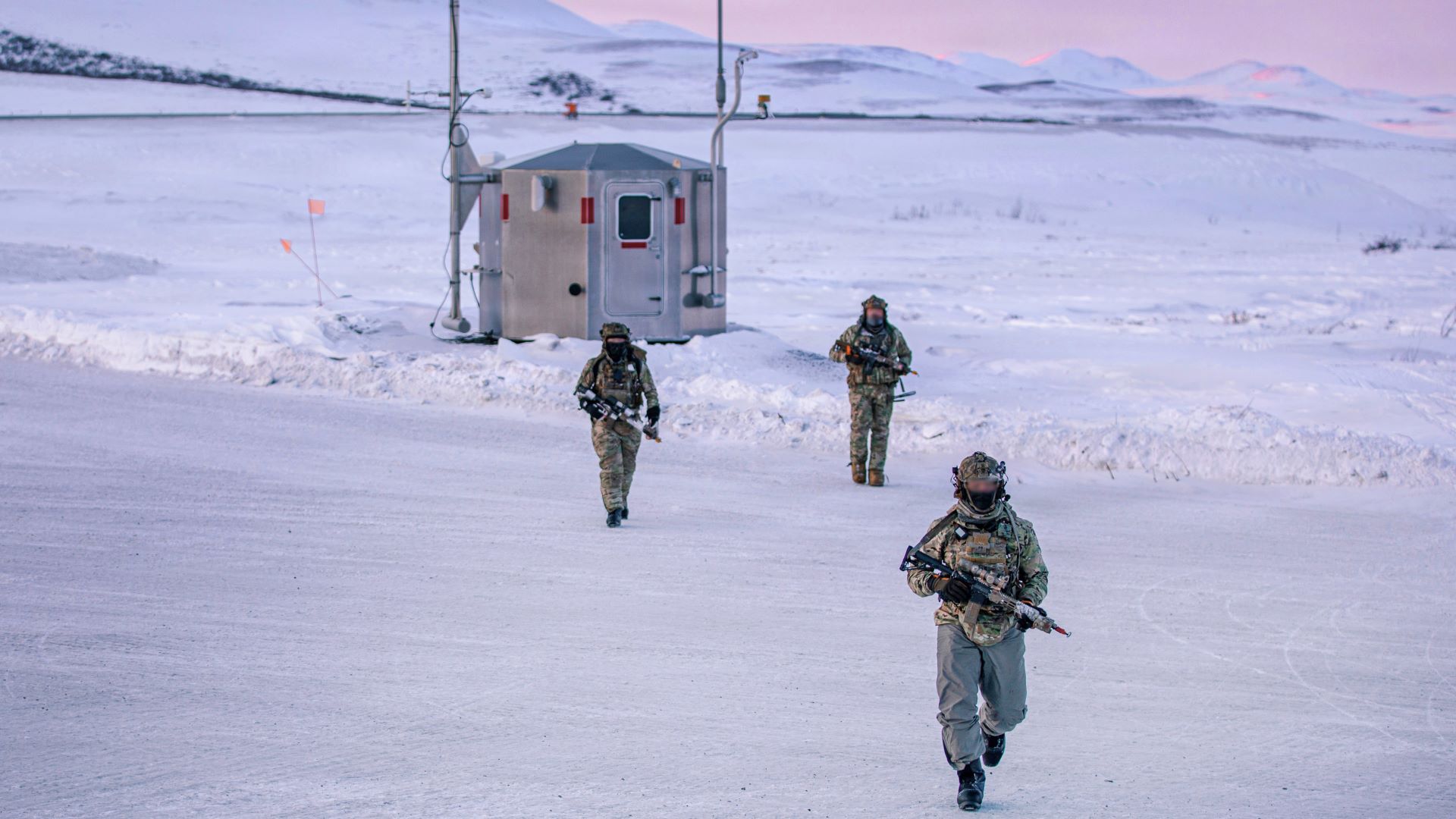 Body image: U.S. Marine Raiders assigned to Marine Forces Special Operations Command conduct a final assault on an objective during ARCTIC EDGE 2026 (AE26) at Red Dog Mine, Alaska, March 7, 2026. The exercise enhanced the ability of forces to maneuver, sustain operations and maintain readiness in extreme cold-weather and austere Arctic environments. AE26 is a NORAD and U.S. Northern Command-led homeland defense exercise designed to improve readiness, demonstrate capabilities, and enhance Joint and Allied Force interoperability in the Arctic. (U.S. Army photo by Staff Sgt. Ashley Low) 