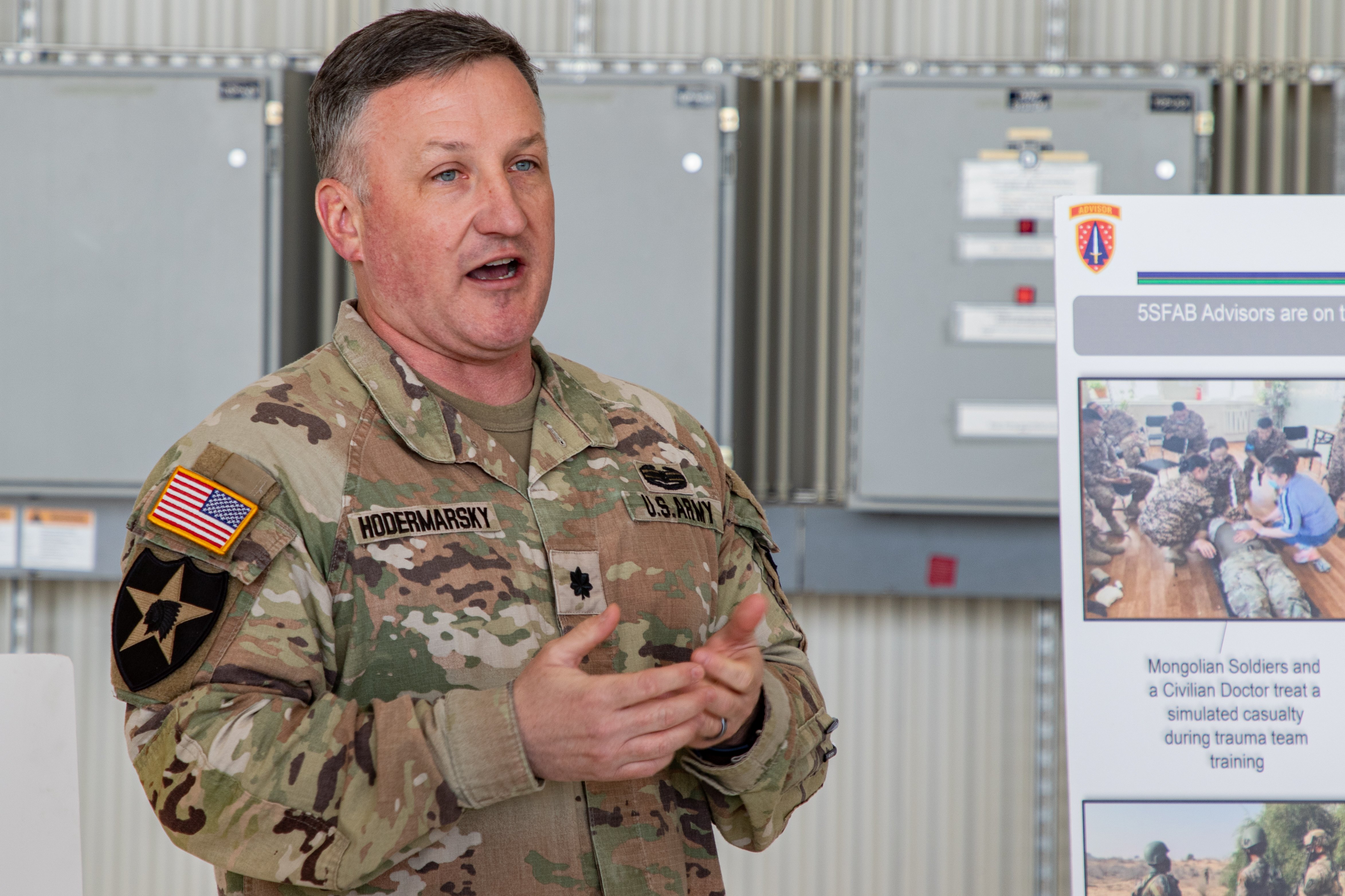 U.S. Army Lt. Col. Dan Hodermarsky, commander of 3rd Squadron, 5th Security Force Assistance Brigade, briefs congressional delegation members on the unit's mission and partnerships across the Pacific during a visit to Joint Base Lewis-McChord, Washington, April 25, 2025. 5th SFAB builds critical interoperability by advising partner forces on the fundamentals of combined arms operations, enhancing joint and coalition readiness. (U.S. Army photo by Sgt. Rebecca Watkins)