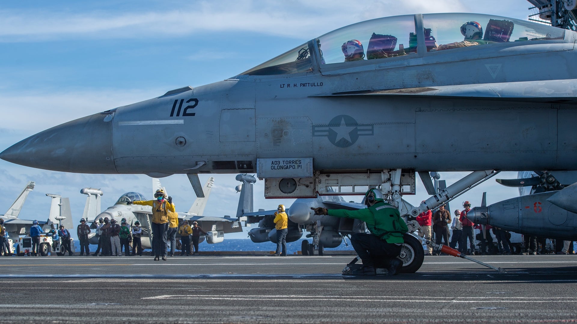 PHILIPPINE SEA (Dec. 27, 2022) An F/A-18F Super Hornet from the “Fighting Redcocks” of Strike Fighter Squadron (VFA) 22 prepares to launch from the flight deck of the aircraft carrier USS Nimitz (CVN 68). Nimitz is in 7th fleet conducting routine operations. 7th Fleet is the U.S. Navy's largest forward-deployed numbered fleet, and routinely interacts and operates with 35 maritime nations in preserving a free and open Indo-Pacific region. (U.S. Navy photo by Mass Communication Specialist 2nd Class Justin McTaggart)