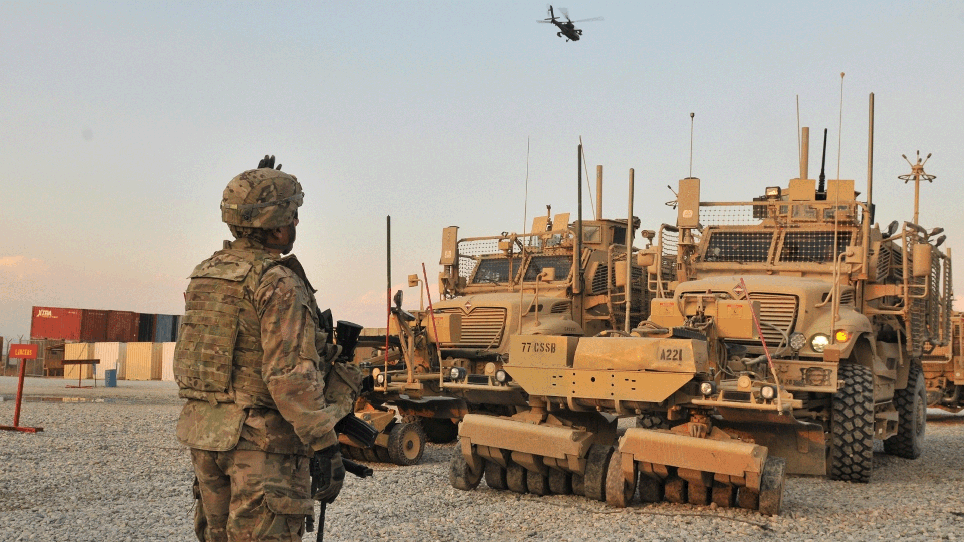 Marines of 1st Platoon, Combat Logistics Company 115 return to the safety of Camp Fallujah the morning of May 24, 2006.
