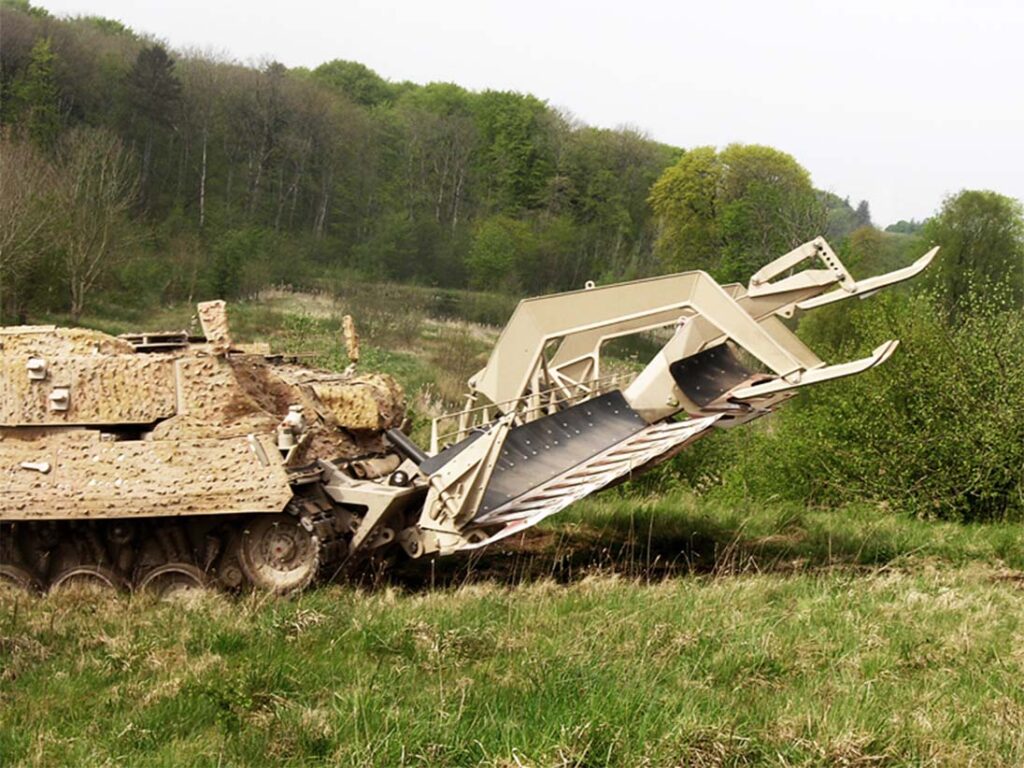 FFG’s Wisent 1 mine-clearing variant with Pearson Engineering plough attachment, were delivered to the Ukrainian Forces in 2023. The ploughs have ground-engaging tines arranged across the full width of the vehicle to displace buried, pressure-fuzed mines and create a safe route through minefields. [FFG]