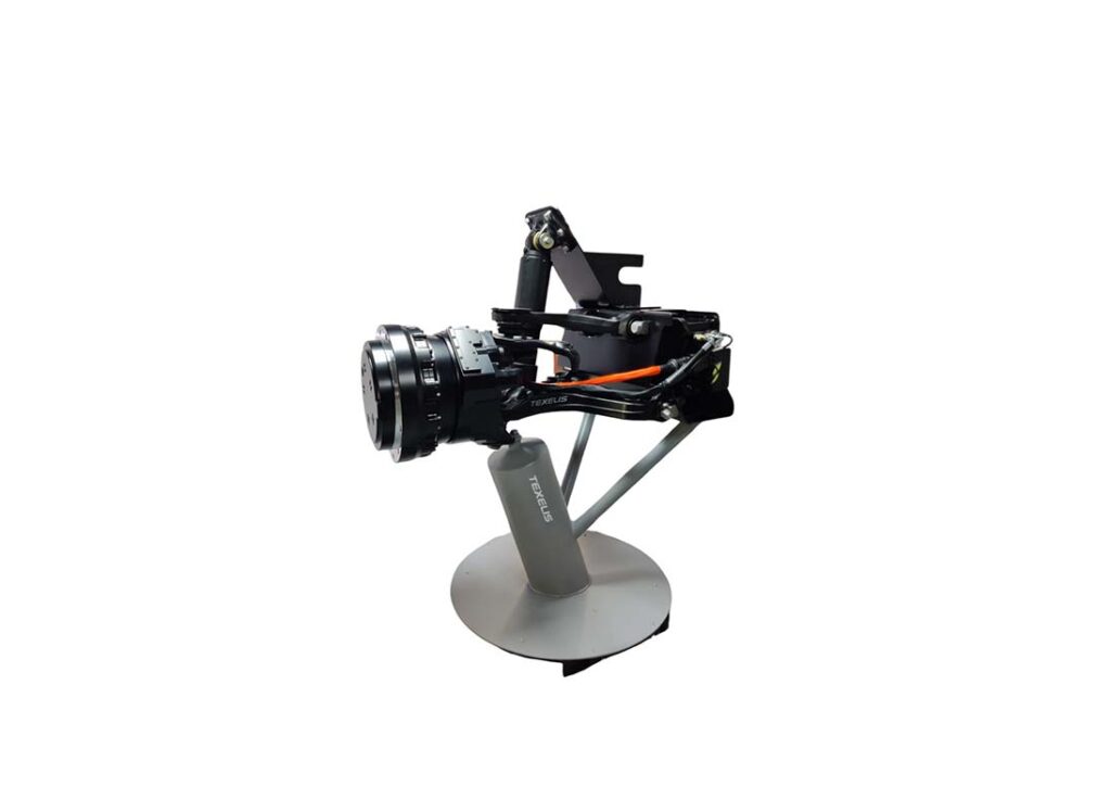 A Texelis HED system hub drive unit. To the left is where the wheel would be attached; to the right is a control/energy panel that could be placed anywhere inside the vehicle. [Texelis]