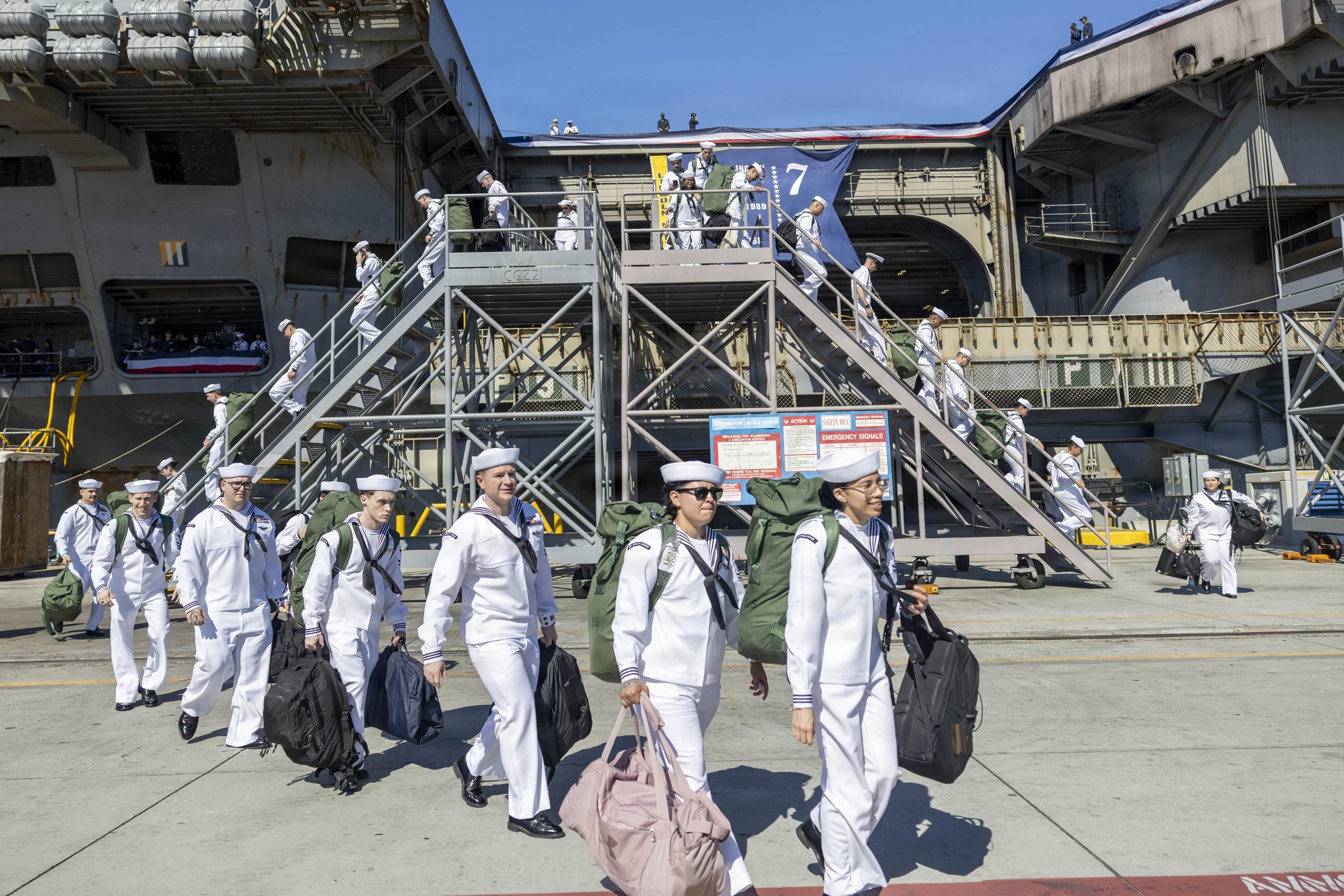 Sailors aboard Nimitz-class aircraft carrier USS Abraham Lincoln (CVN 72), return to home port in San Diego, Calif., Oct. 8, 2026. Abraham Lincoln, the flagship of Carrier Strike Group (CSG) 3, returns to its homeport of San Diego following 10 months of operations in the U. S. 5th and 7th Fleet areas of operations. An integral part of U.S. Pacific Fleet, U.S. 3rd Fleet leads naval forces in the region and provides realistic, relevant training necessary to execute our Navy’s role across the full spectrum of military operations – from combat operations to humanitarian assistance and disaster response. U. S. 3rd Fleet works together with allies and partners to advance freedom of navigation and overflight, the rule of law, and other principles that underpin security in the region. (U.S. Navy photo by Mass Communication Specialist Seaman Maliq J. Martin)