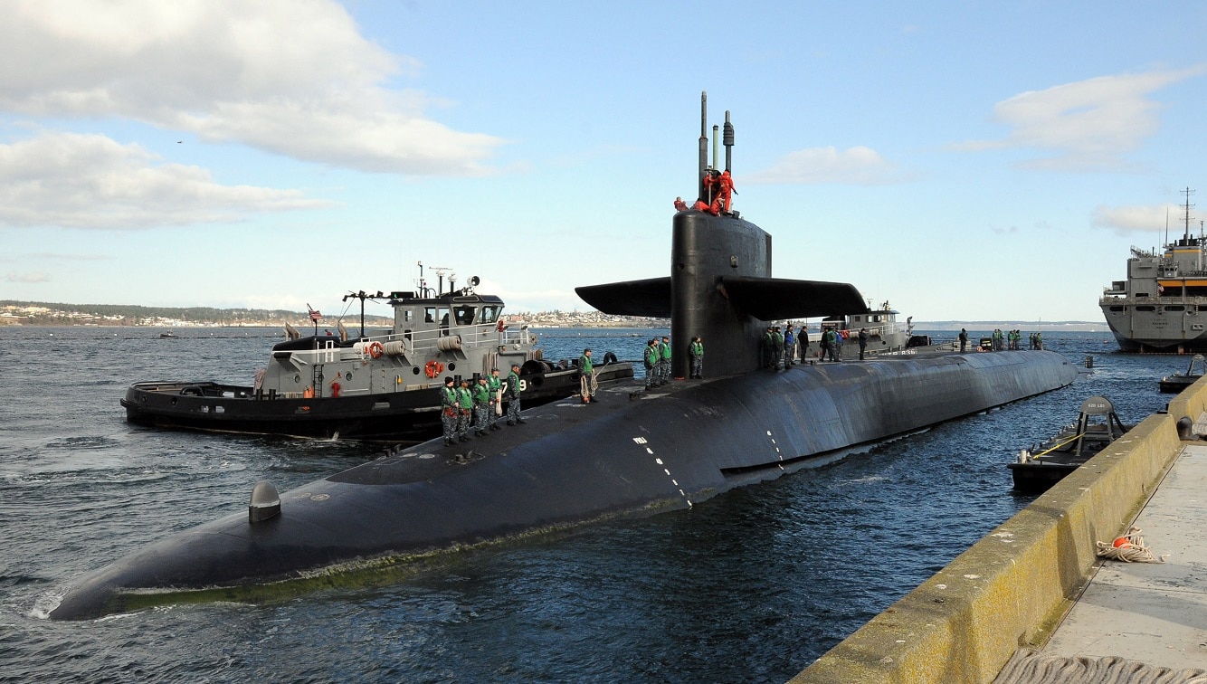 The guided-missile submarine USS Ohio (SSGN 726) prepares to moor at Naval Magazine Indian Island. Ohio recently completed a 14-month forward deployment to the U.S. 7th Fleet area of responsibility.