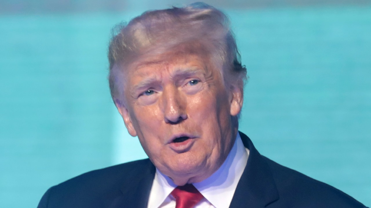 Then-Former President of the United States Donald Trump speaking with attendees at the 2022 Student Action Summit at the Tampa Convention Center in Tampa, Florida. By Gage Skidmore.