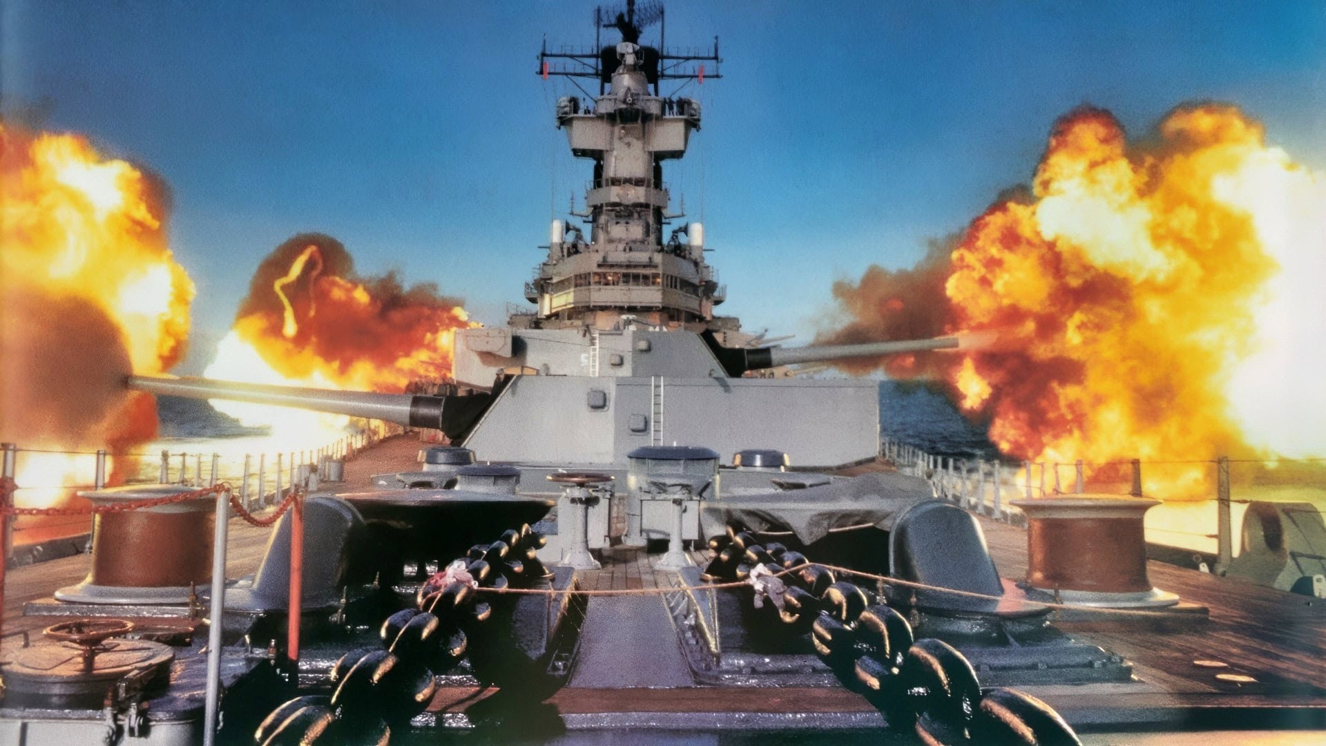 Copy negative of the US Navy (USN) Iowa Class (as built) Battleship USS NEW JERSEY (BB 62) firing a 21-gun broadside. Exact date shot unknown. Image Credit: Creative Commons.
