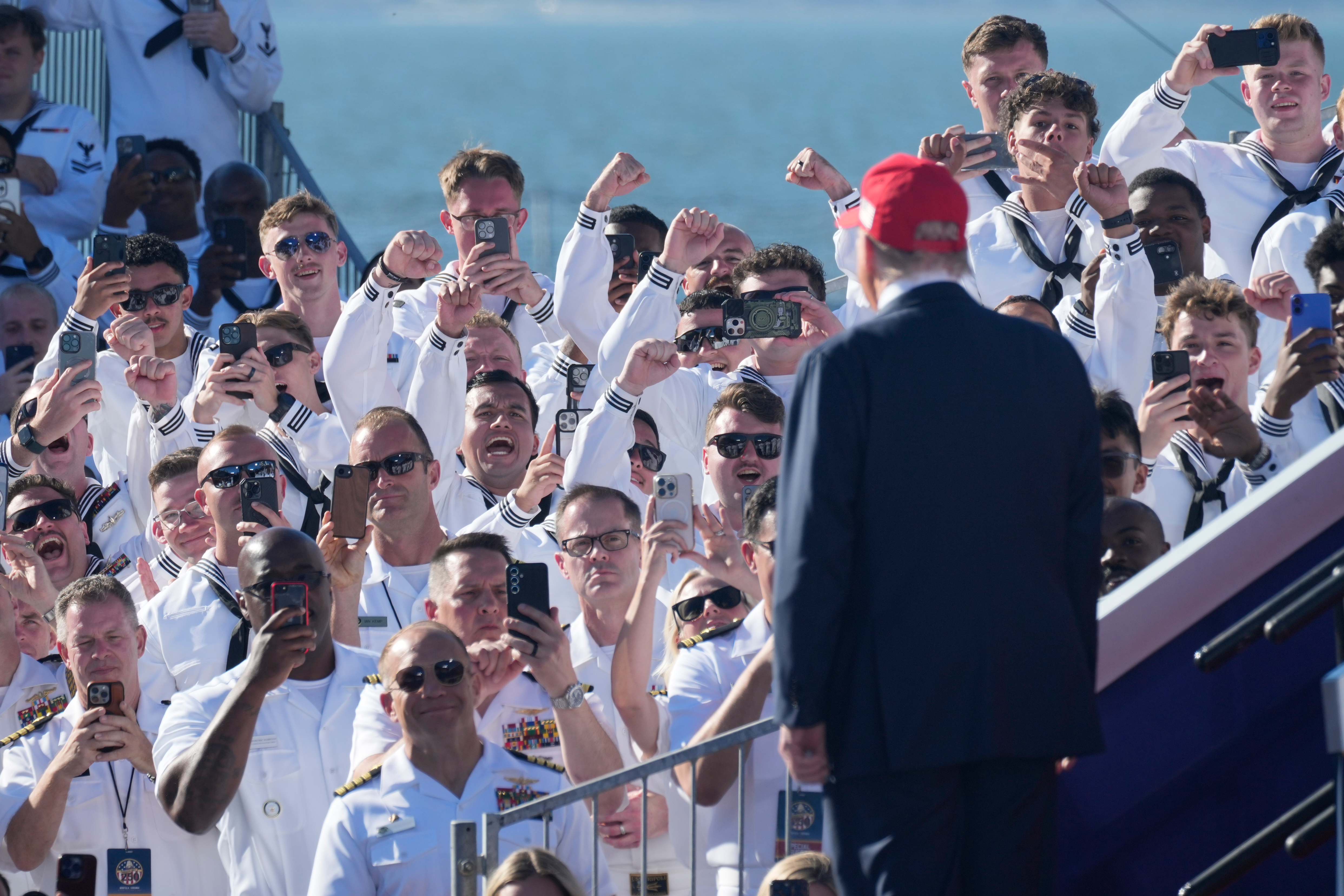 President Donald Trump arrives to speak during a celebration for the 250th anniversary of the U.S. Navy aboard the USS Harry S. Truman, Oct. 5, 2025. (Steve Helber/AP)