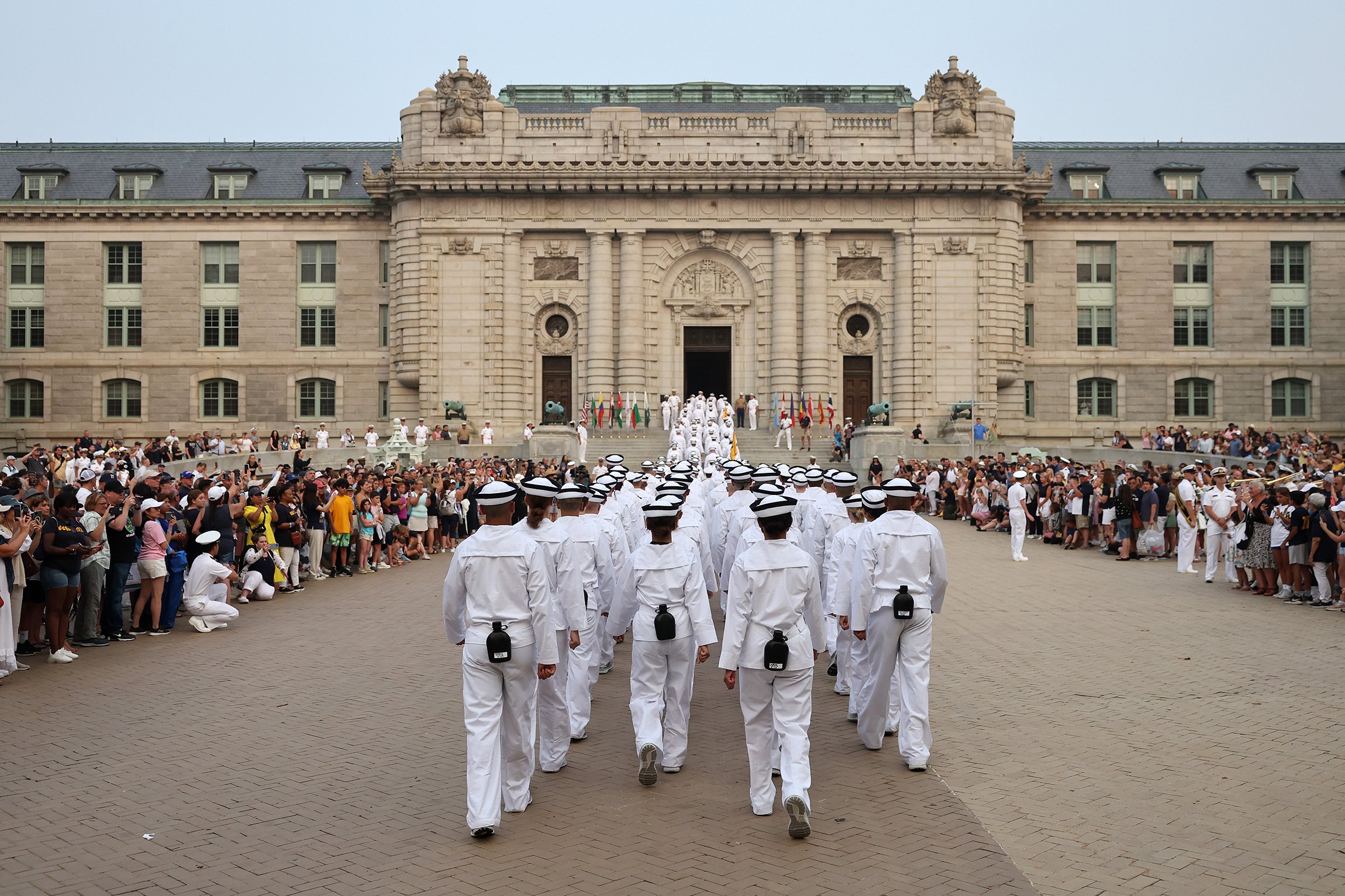 ANNAPOLIS, MARYLAND - JUNE 29: Incoming plebes (freshmen) march into Bancroft Hall after taking part in their Oath of Office Ceremony during Induction Day at the U.S. Naval Academy on June 29, 2023 in Annapolis, Maryland. Approximately 1,200 midshipmen with the Naval Academy's Class of 2027 took part in Induction Day which is their first official day of Plebe Summer and their transition from civilians into fourth-class midshipmen. (Photo by Kevin Dietsch/Getty Images)