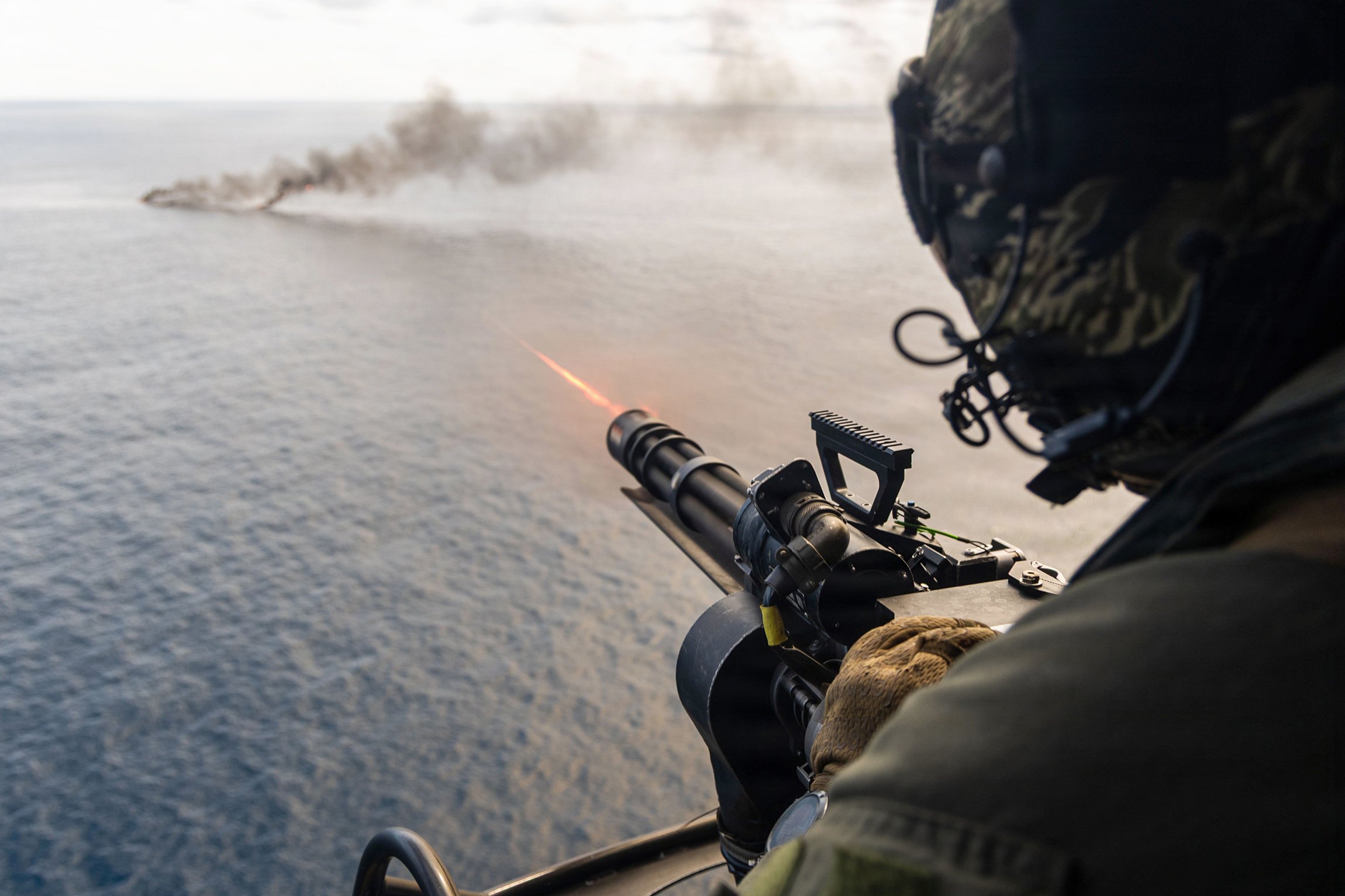 A Marine Corps UH-1Y Venom crew chief assigned to Littoral Combat Force-24 fires an M134 minigun during a maritime interdiction operation while underway in the Pacific Ocean, Sept. 2, 2026. The vessel of interest was boarded and cleared before being destroyed. U.S. military forces are deployed to the U.S. Southern Command area of responsibility supporting Joint Task Force Western Hemisphere, War Department-directed operations and the president's priorities to disrupt illicit drug trafficking, deter malign actors and protect the homeland through continuous presence.