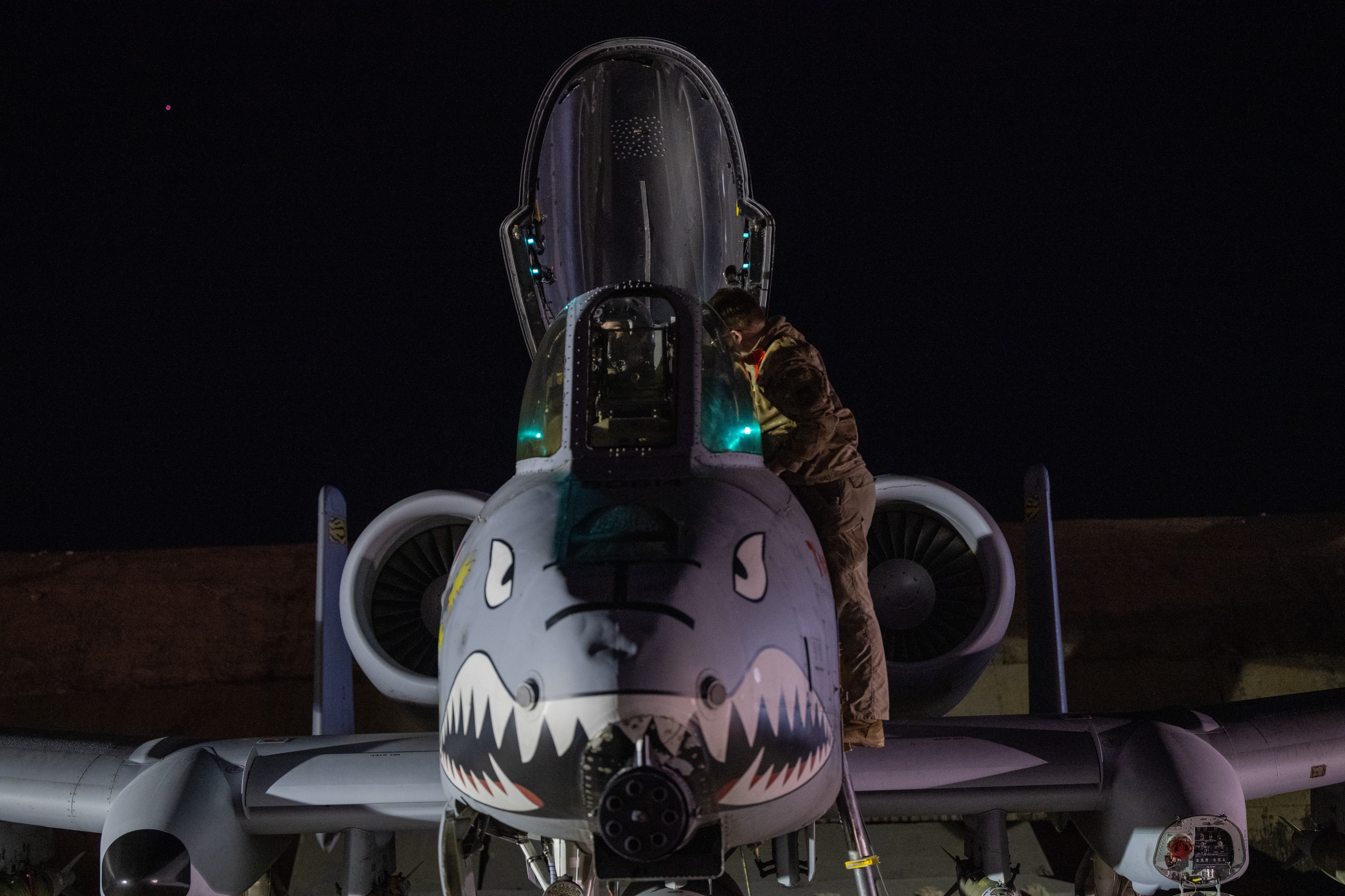 A U.S. airman prepares an A-10 Thunderbolt II for flight from a base in the U.S. Central Command area of operations, Dec. 19, 2025. (U.S. Air Force)