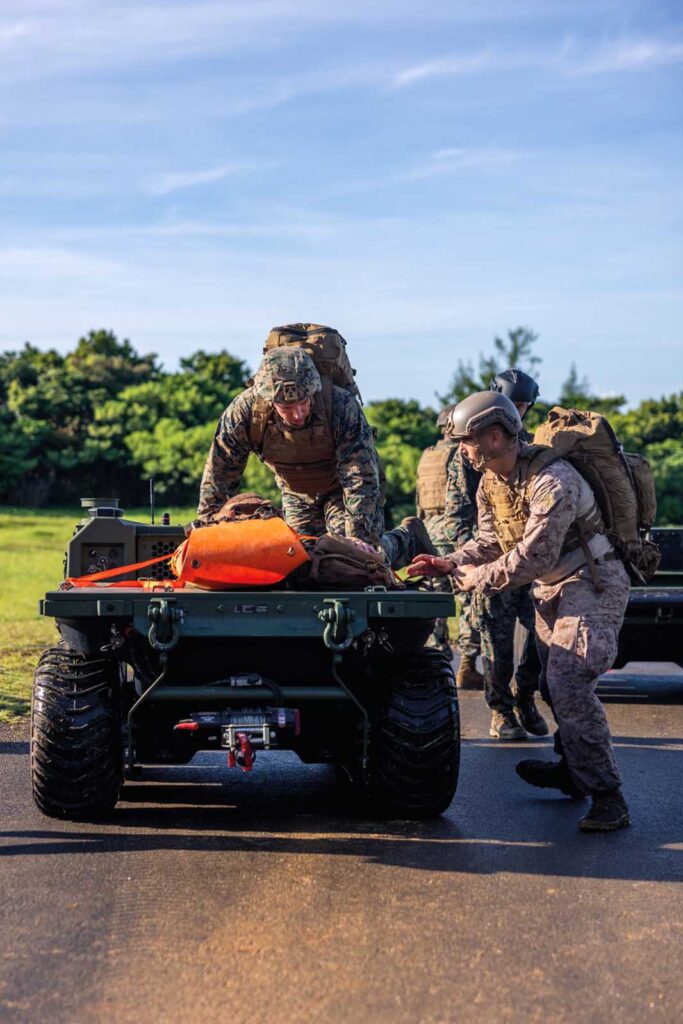 Casualty evacuation unmanned ground vehicle carrying a simulated wounded soldier