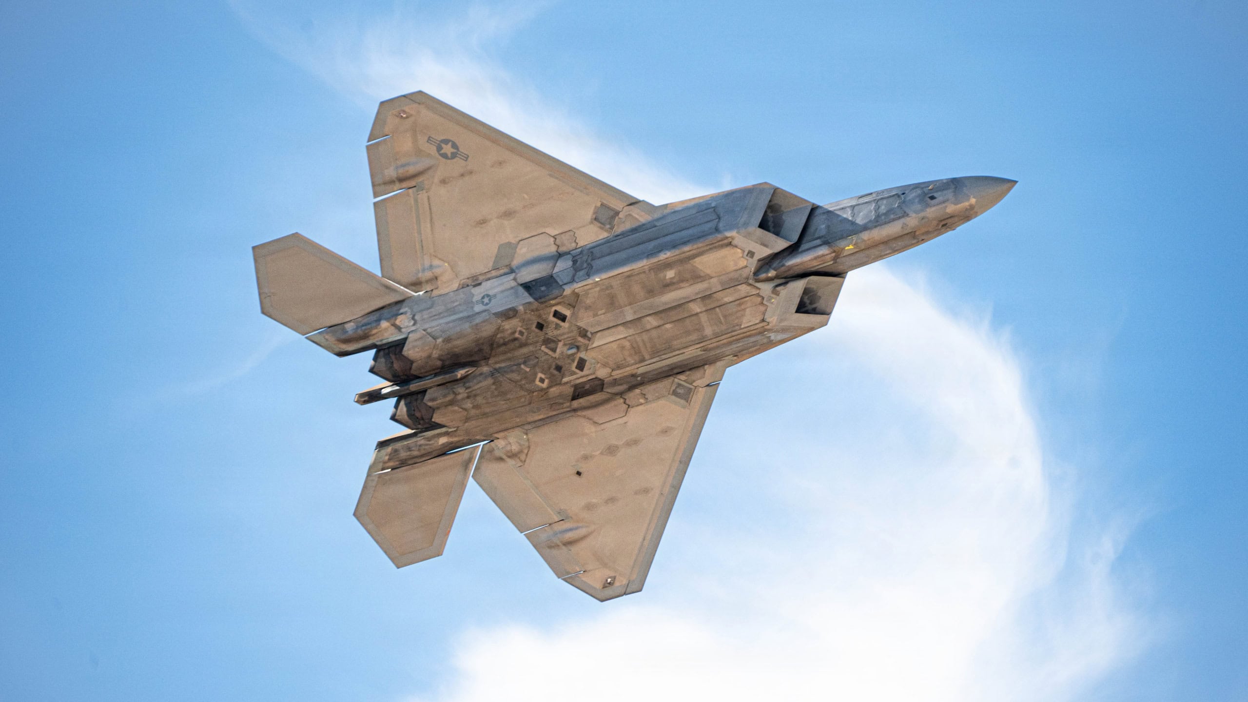 U.S. Air Force Capt. Nick “Laz” Le Tourneau, pilot and commander of the F-22 Raptor Aerial Demonstration Team, performs a practice demonstration for the 2026 Heritage Flight Training and Certification Course at Davis-Monthan Air Force Base, Arizona, Feb. 27, 2026. The Heritage Flight Training and Certification Course is an annual event where military and civilian pilots train together to fly in formations, showcasing both modern and vintage military aircraft. These flights are performed at airshows across the country to honor the service and contributions of every U.S. Airmen, past and present, while educating the general public on the importance of the U.S. Air Force and its mission. (U.S. Air Force photo by Staff Sgt Mary Bowers)
