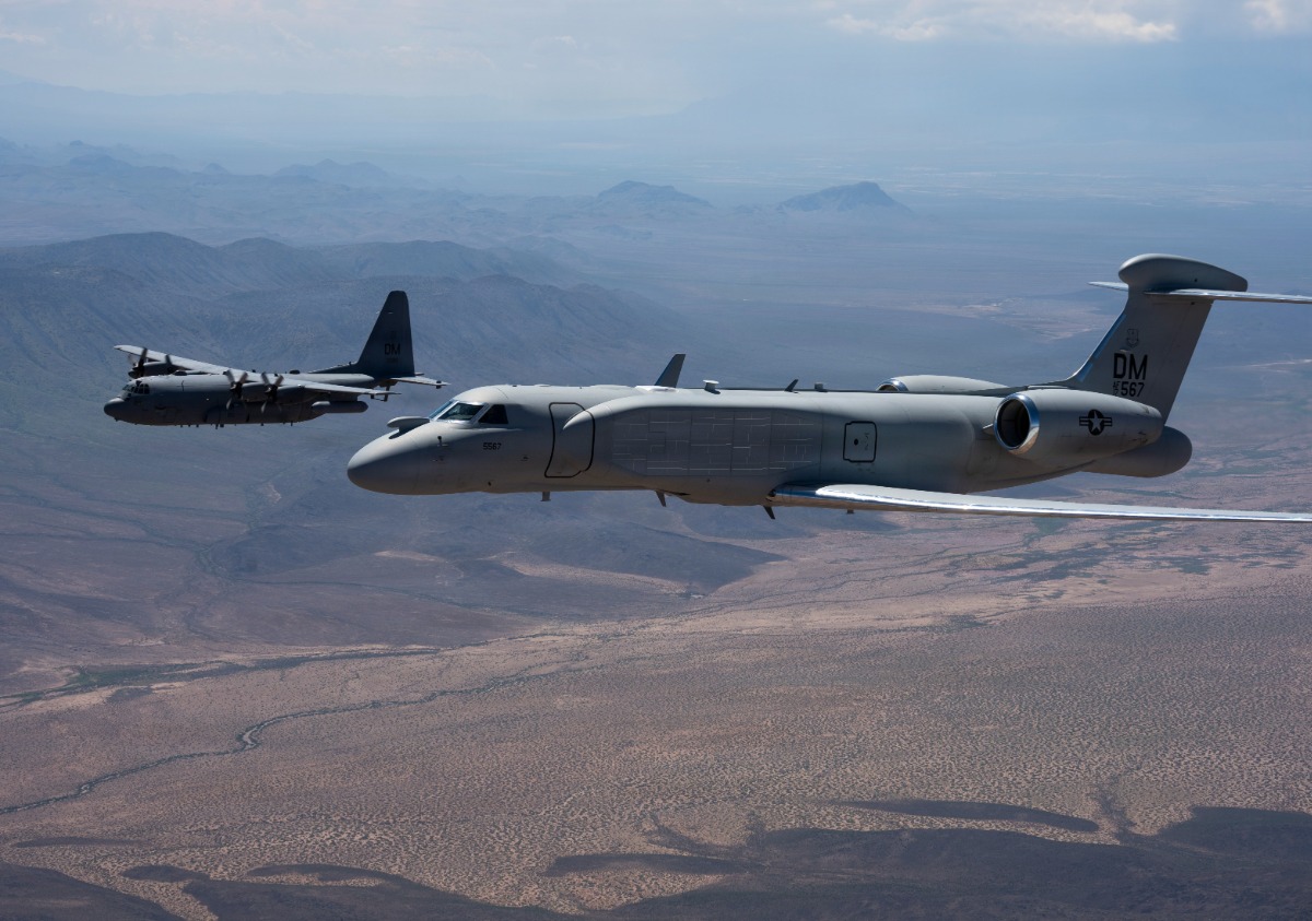 EC-130H Compass Call aircraft and an EA-37B Compass Call fly in formation over Southern Arizona, Sept. 3, 2026. Photo by Devlin Bishop