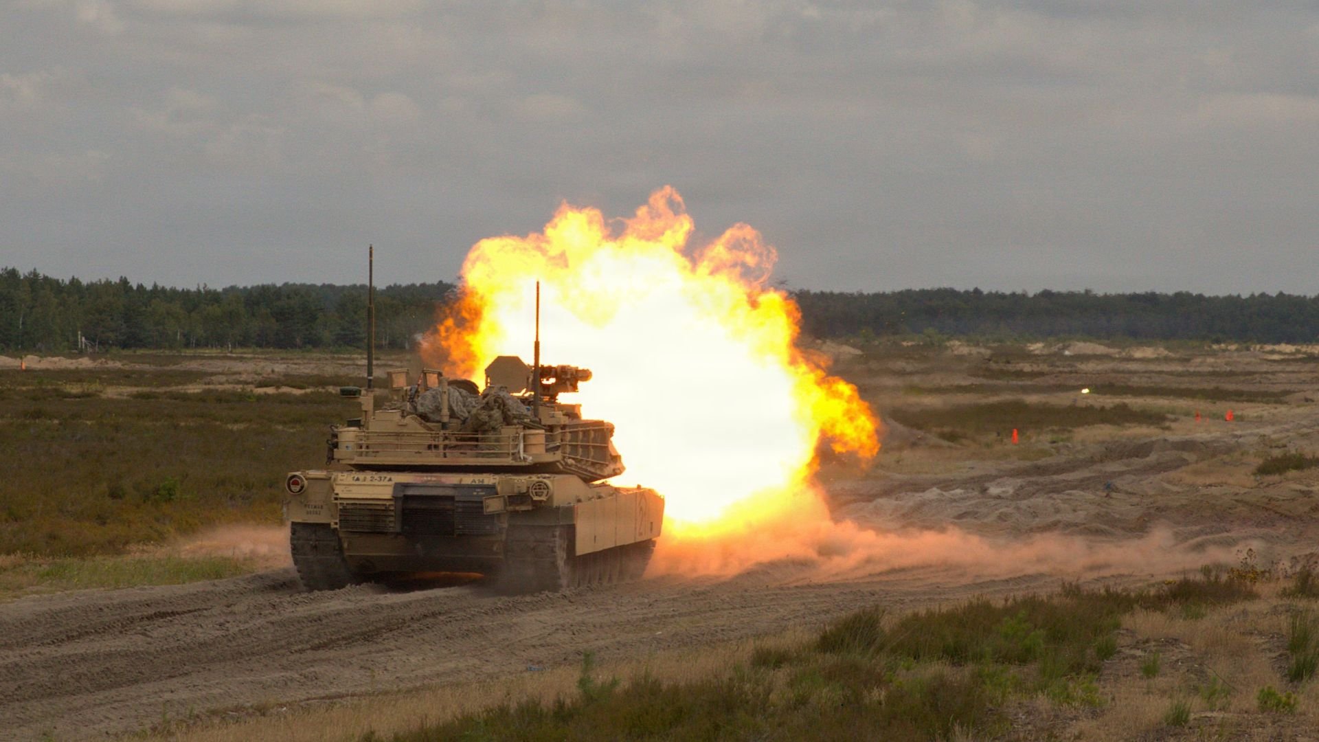 U.S. Soldiers from Alpha Company, 2nd Battalion, 37th Armor Regiment, 1st Armored Brigade Combat Team, 1st Armored Division, transition to offensive fighting maneuvers using the main cannon while advancing on the objective, near Boleslawiec, Poland, July 23, 2026. U.S. Army V Corps, headquartered in Fort Knox, Kentucky, is the Army’s only forward-deployed corps in Europe, providing command and control of rotational forces in support of NATO allies and partners. V Corps enhances regional security, strengthens interoperability, and supports deterrence efforts across the European theater. (U.S. Army Reserve photo by Staff Sgt. Logan Ubaldo Lechuga)