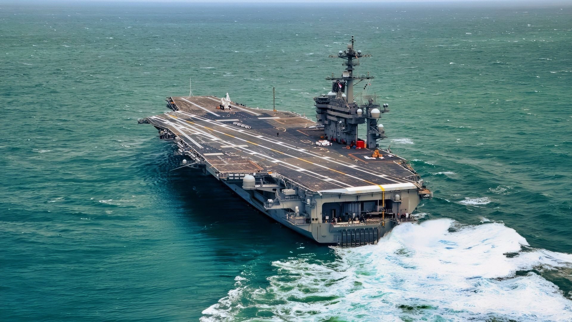The Nimitz-class aircraft carrier USS George Washington (CVN 73) transits through the Atlantic Ocean May 25, 2023. George Washington was underway after completing its mid-life refueling and complex overhaul and sea trials, a comprehensive test of the ship’s system and technologies. (U.S. Navy photo by Mass Communication Specialist 3rd Class Nicholas A. Russell)