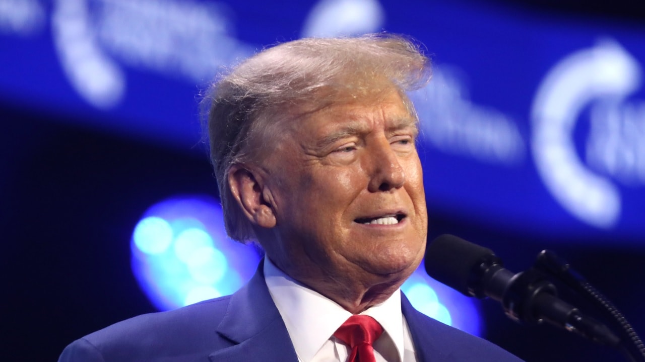 Former President of the United States Donald Trump speaking with attendees at the 2023 Turning Point Action Conference at the Palm Beach County Convention Center in West Palm Beach, Florida. By Gage Skidmore.