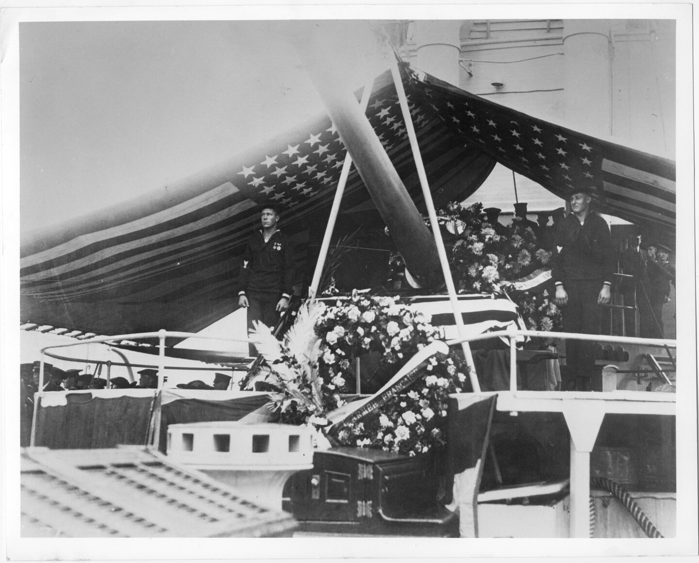 The flag-draped casket of the Unknown Soldier aboard the Olympia upon the ship’s arrival in Washington, D.C., in November 1921. (Library of Congress)