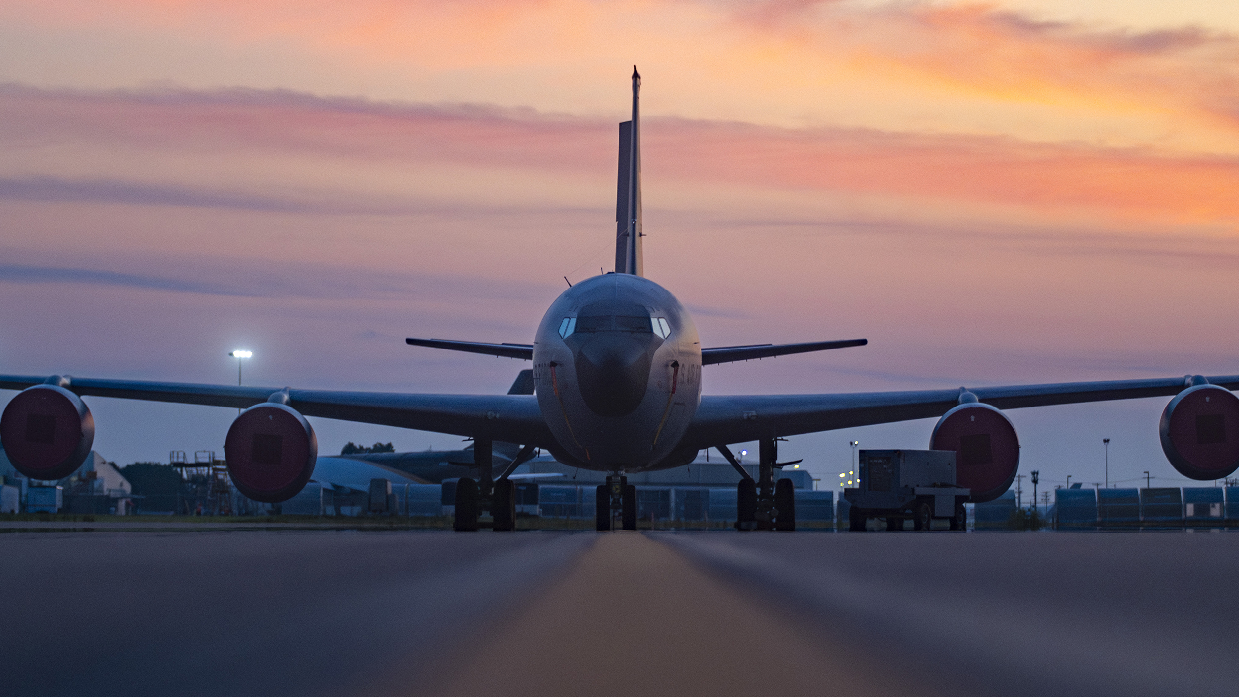 A KC-135 Stratotanker with the 121st Air Refueling Wing sits on the flight line during the sunrise at Rickenbacker Air National Guard Base, Columbus, Ohio, August 10, 2025. The KC-135 Stratotanker is an essential aircraft for the Air Mobility Command because it provides core aerial refueling for the United States Air Force to ensure rapid global reach. (U.S. Air National Guard photo by Staff Sgt. Ivy Thomas)