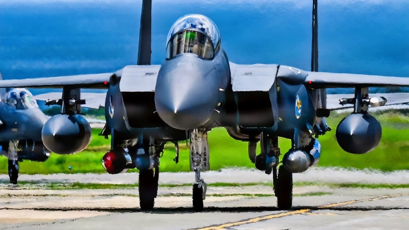 A U.S. Air Force F-15EX Eagle II and F-15E Strike Eagles assigned to 85th Test and Evaluation Squadron, Eglin Air Force Base, Florida, land at Kadena Air Base, Japan, June 29, 2026. The test aircraft arrival supported the Department of War's effort to modernize U.S. airpower in the Indo-Pacific and prepared Kadena personnel and the local community for the F-15EX's arrival. (U.S. Air Force photo by Airman 1st Class Gracelyn Hess)