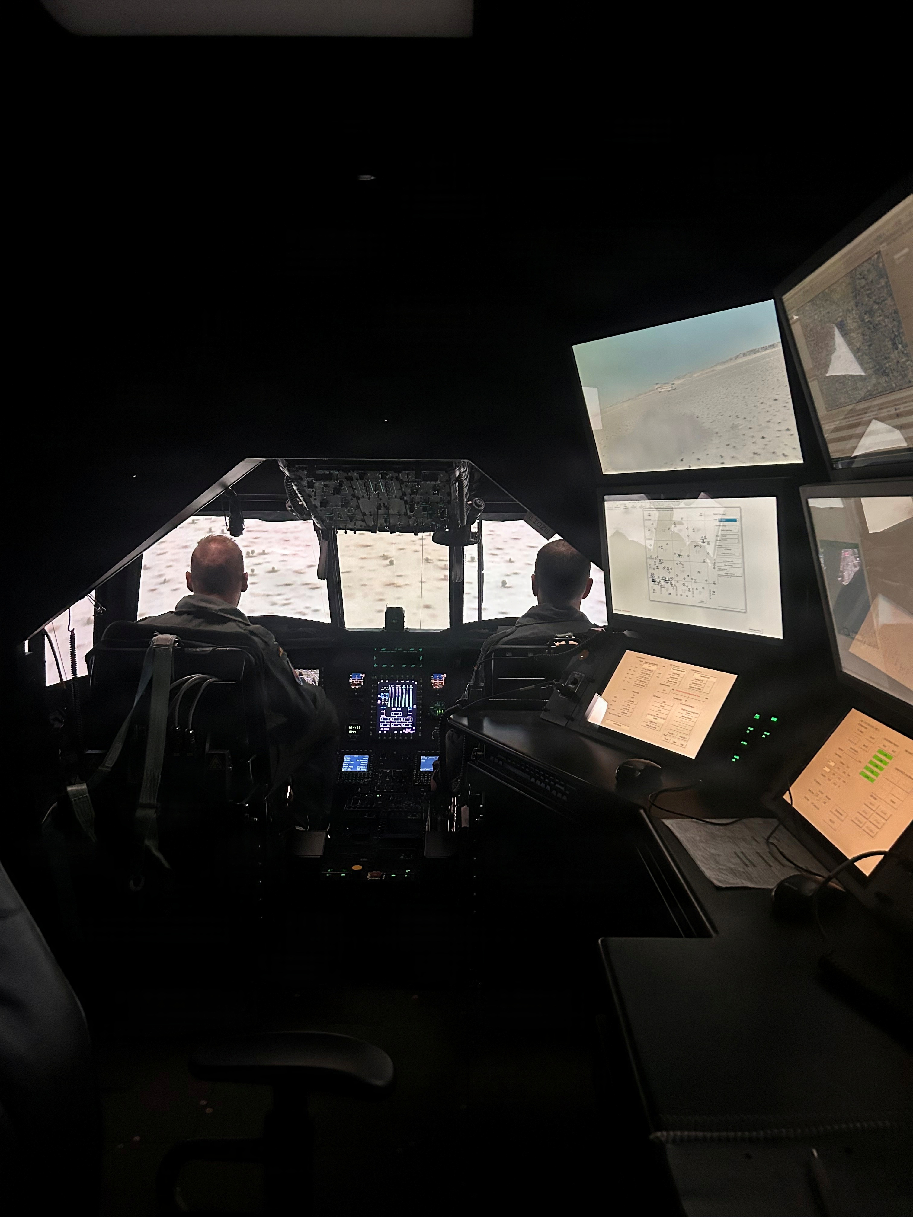 Two Bundeswehr Luftwaffe pilots train at U.S. Army Garrison Ansbach’s Illesheim Flight Simulator Complex on Storck Barracks. (Gerlinde Hoyle/U.S. Army Garrison Ansbach)