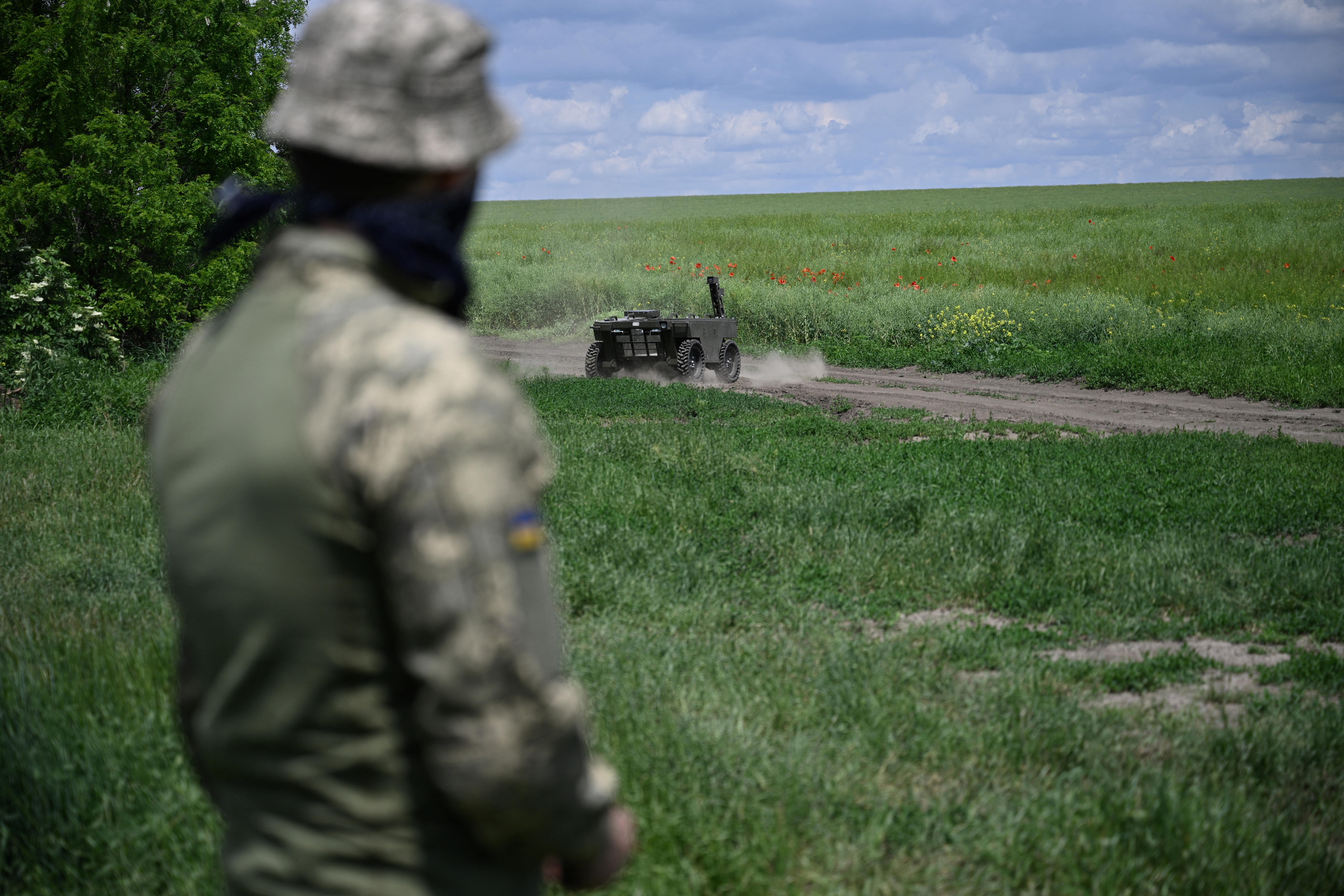 A Ukrainian soldier controls an unmanned vehicle during a field test of its off-road capabilities in an undisclosed location in Zaporizhzhia region on June 5, 2026, amid the Russian invasion of Ukraine. (Genya Savilov / AFP via Getty Images)