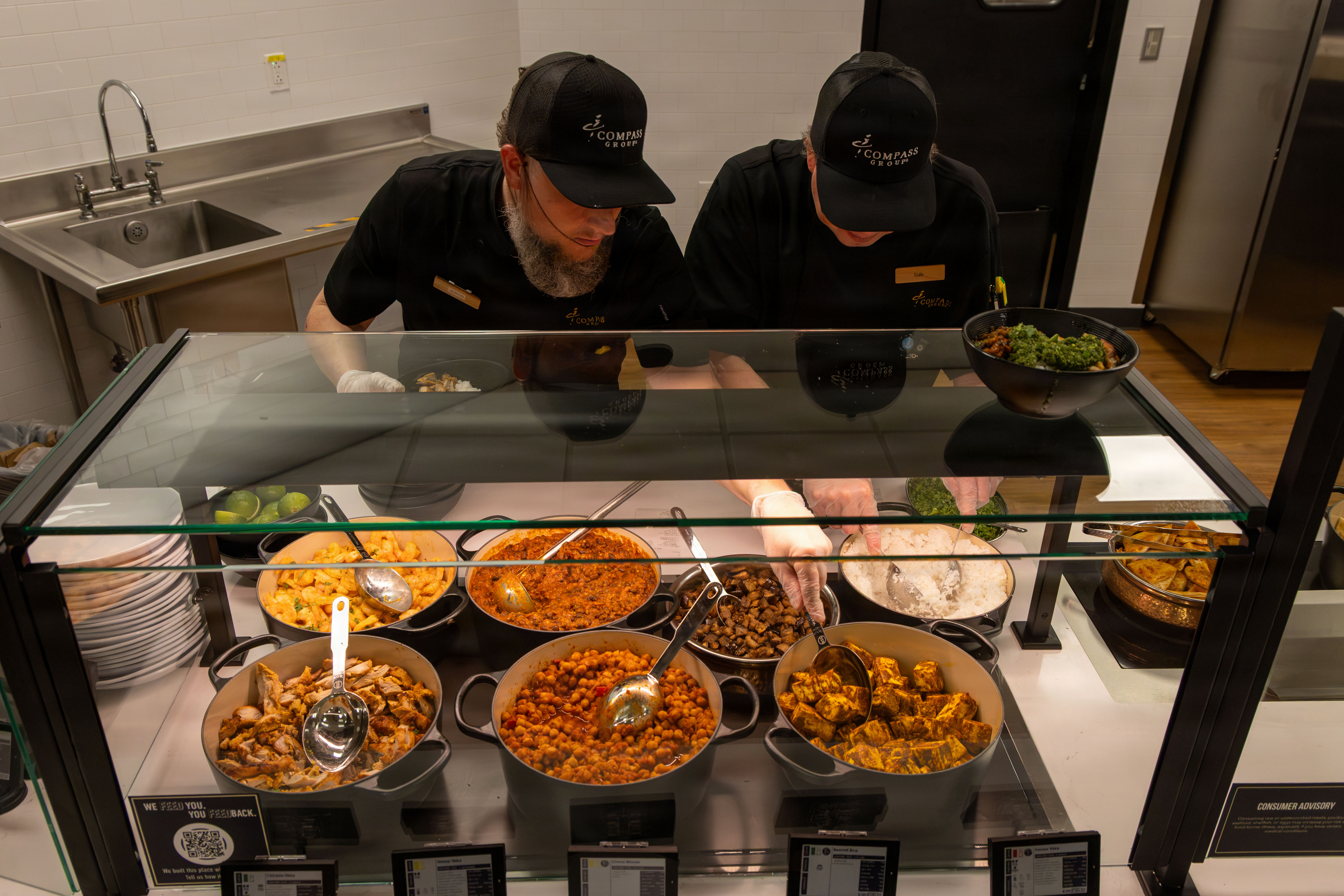 Rally Point Bistro food service employees prepare meals during the dining venue grand opening at Fort Bragg, North Carolina, on Sept. 29, 2026. (Staff Sgt. Nirak Garcia Navarro/U.S. Army)