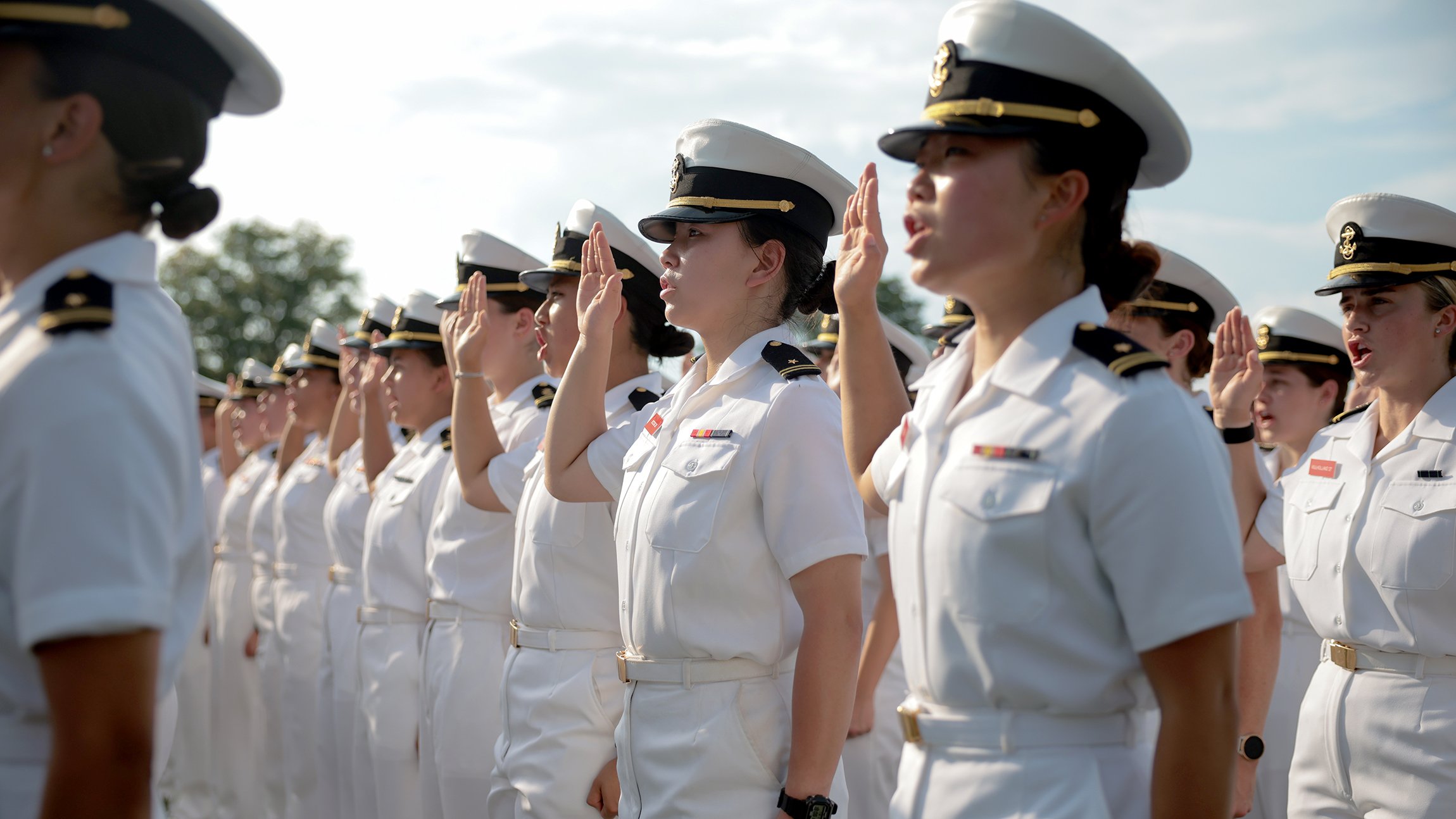ANNAPOLIS, MARYLAND - JUNE 26: Upperclassmen salute in the Oath of Office ceremony during Induction Day at the U.S. Naval Academy on June 26, 2025 in Annapolis, Maryland. To mark the start of Plebe Summer, approximately 1,200 plebes, or freshmen in the Class of 2029 take part in Induction Day which involves In-processing, medical exams, uniform fittings, haircuts, and learning to salute. (Photo by Kayla Bartkowski/Getty Images)