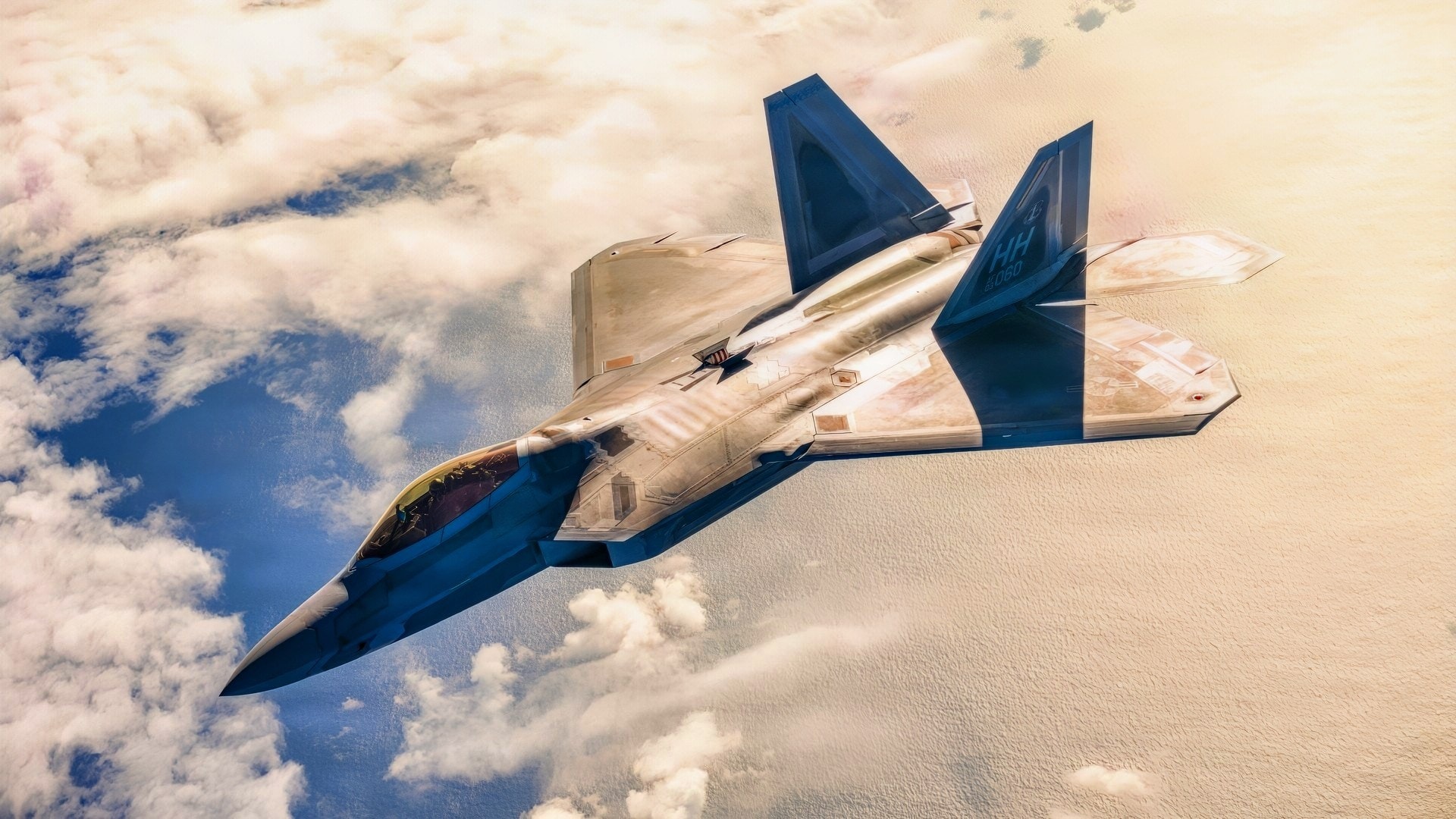 An F-22 Raptor from the Hawaii Air National Guard 154th Wing retreats after mid-flight refueling from a KC-135 Stratotanker assigned to the 128th Air Refueling wing of Milwaukee during Sentry Aloha off the coast of Honolulu, Hawaii on January 14, 2026. Sentry Aloha provides cost-effective and realistic, large-scale training scenarios to prepare warfighters and support the Air National Guard’s position as a crucial component of the nation’s operational force.