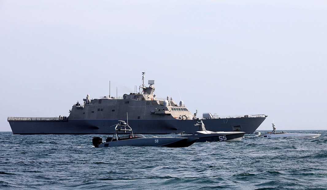 Three uncrewed surface vessels (USVs) are pictured during a USN exercise in the Gulf in 2023. USVs will be a central component of the navy’s future surface force structure. Pictured in the background is a Littoral Combat Ship. [Source: US Navy]