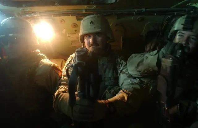 Casey Elliott with the 1st Cavalry Division during an operation along the Euphrates River in Iraq in 2005. (Photo courtesy of the author)