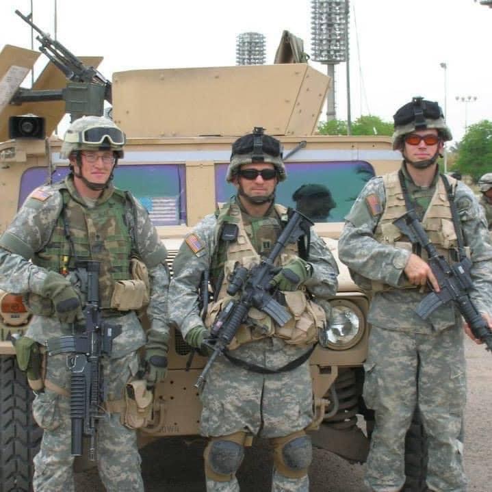 Robert Blair (left) and Doug Dicenzo (middle) in Baghdad in 2005. (Photo credit courtesy of the Blair family)