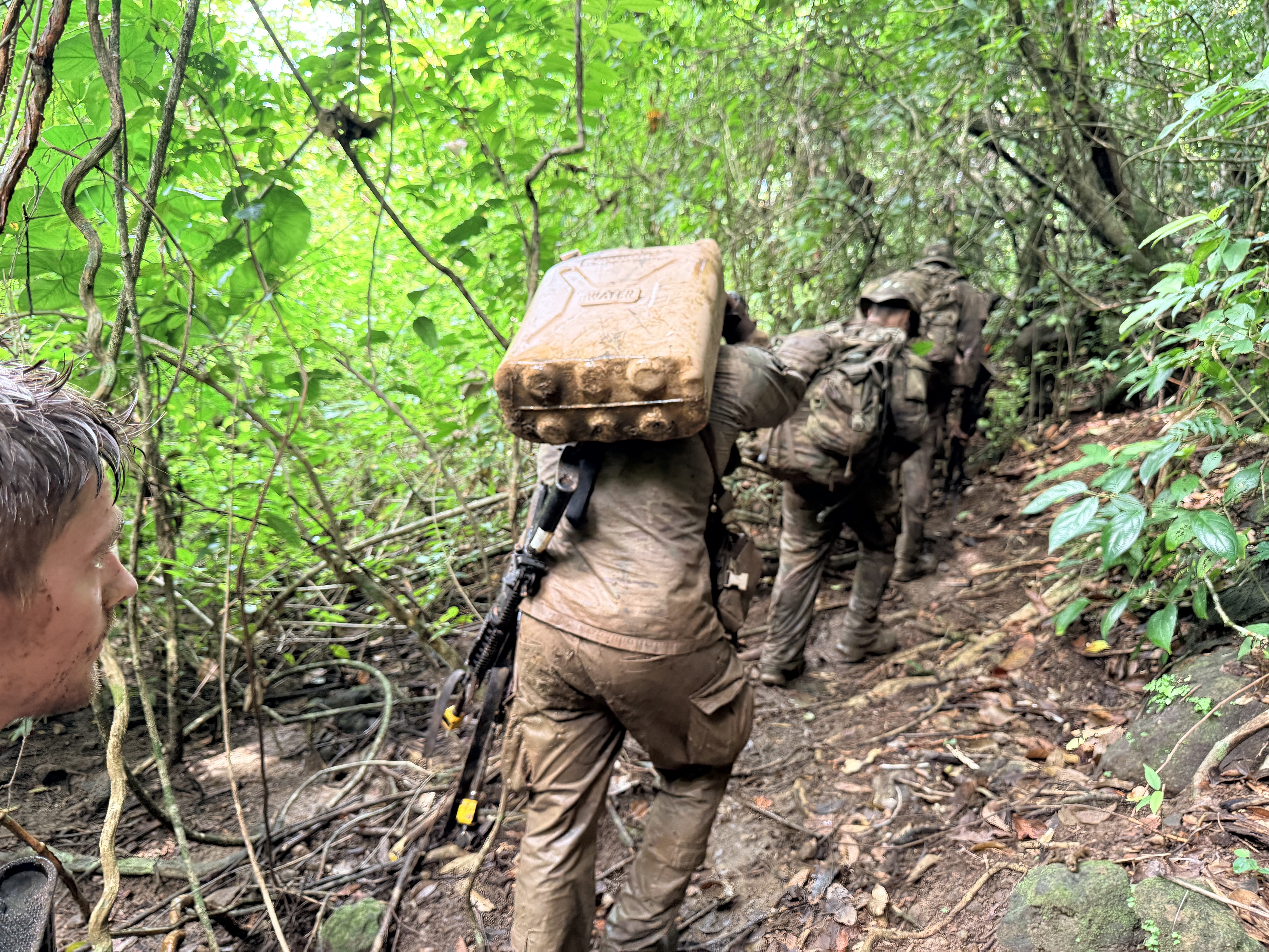 Participants in the U.S. Army's jungle school in Panama hike steep hills as part of the Green Mile on Sept. 24, 2026. (Eve Sampson/staff)
