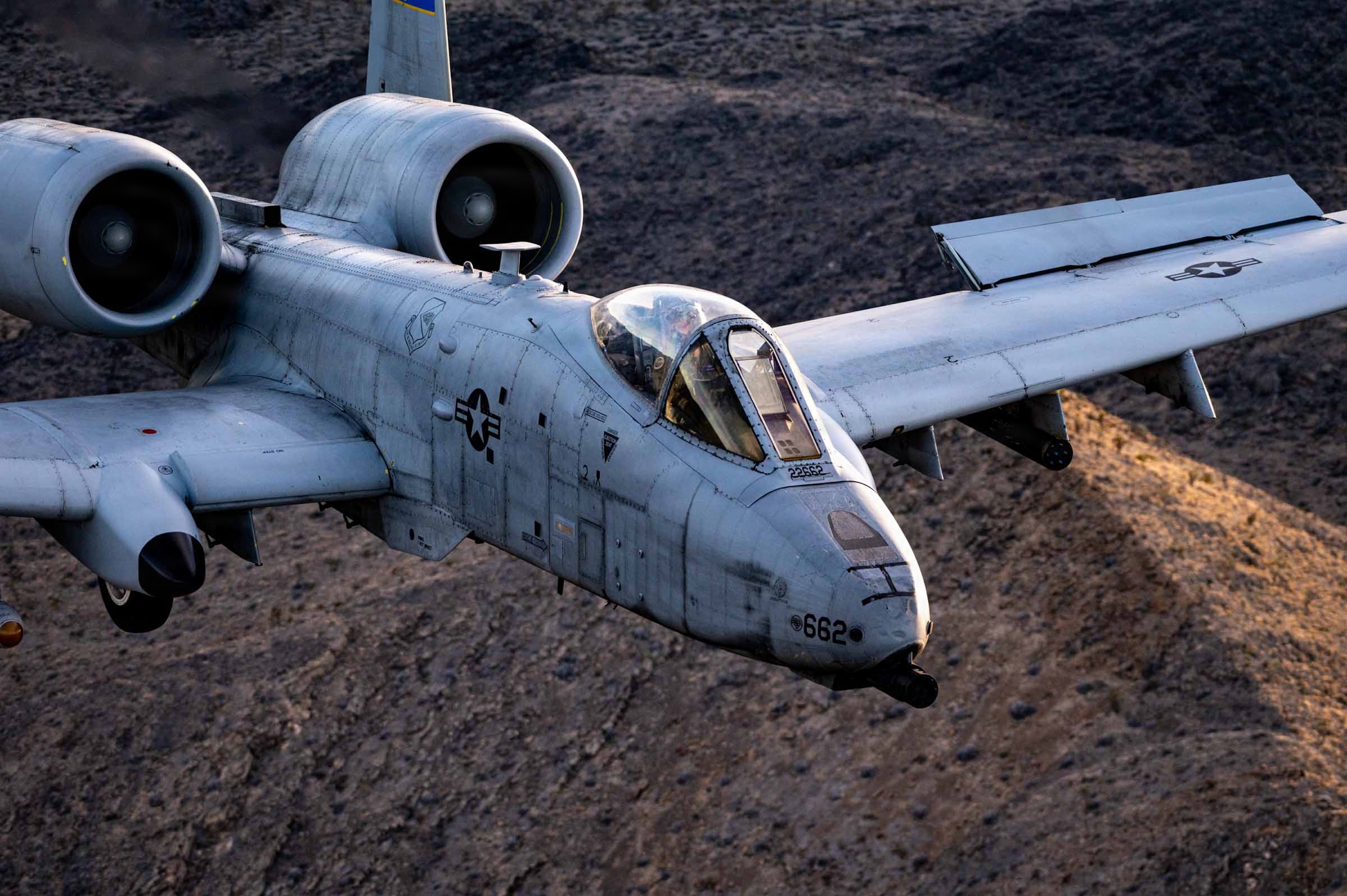An A-10 Thunderbolt II flies over a Nevada test and training range during routine training, Feb. 26, 2026. (Tech. Sgt. Albert Valladares/U.S. Air Force)