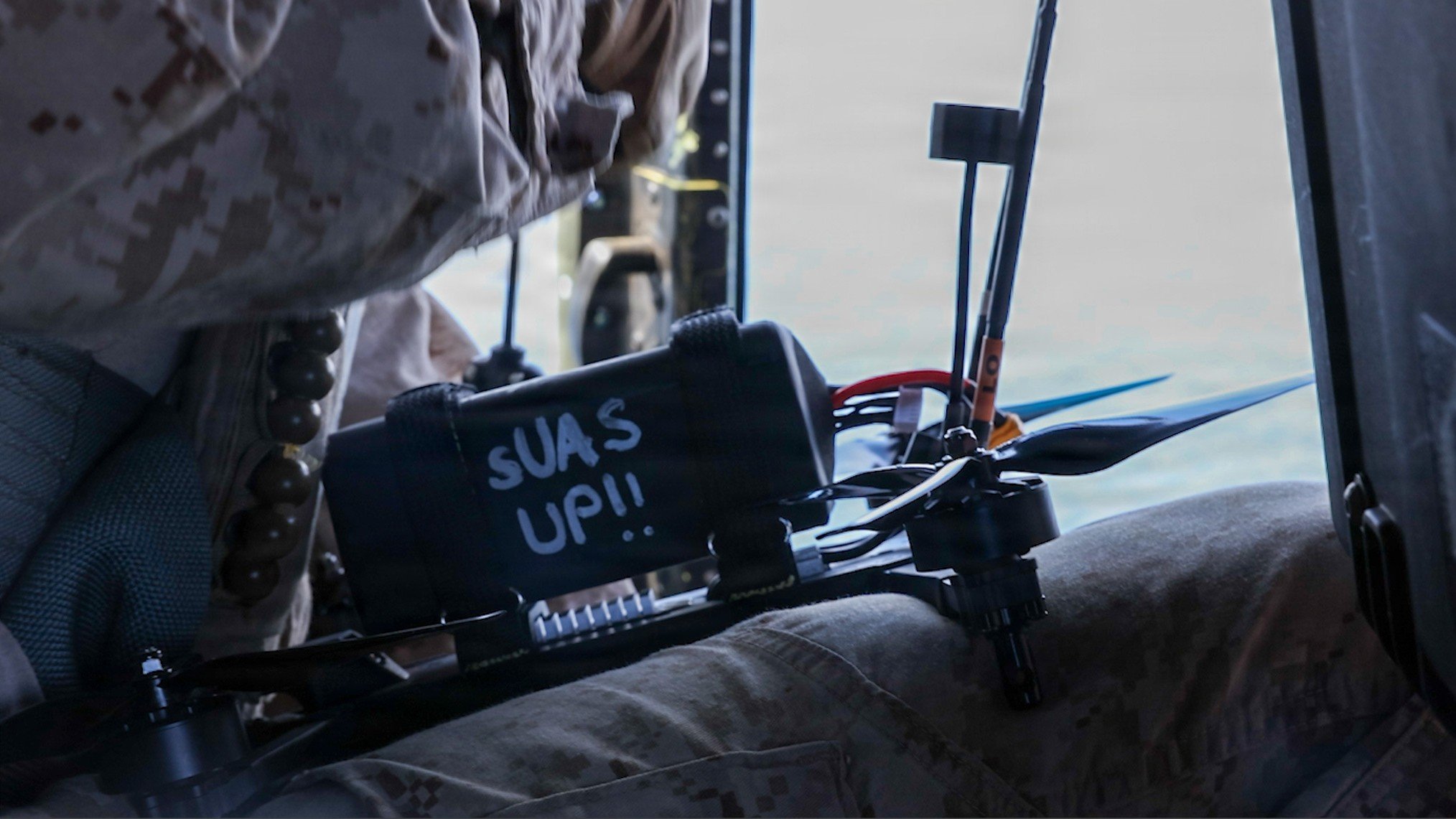 Middle: 3rd image: U.S. Marines with 3rd Light Armored Reconnaissance, 1st Marine Division, Light Attack Helicopter Squadron (HMLA) 169 and Marine Special Operations Command conduct an in-aircraft, first person view unmanned aircraft system integration with an UH-1Y Venom at Marine Corps Base Camp Pendleton, June 16, 2026. The collaborative exercise allowed Marines to determine the feasibility of using FPV UAS from an aircraft and evaluate how to best integrate them to increase combat capabilities and lethality. This exercise aligns with the Secretary of War’s drone dominance memo by executing his direction for operational units to experiment with drones at echelon. (U.S. Marine Corps photo by Lance Cpl. Carlo SouzaDeluca)