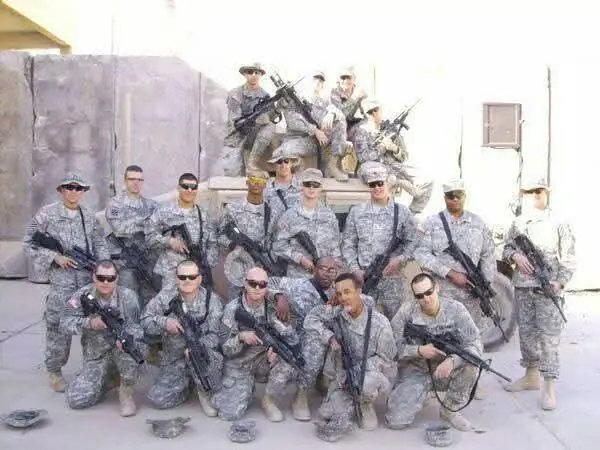 Personal Security Detail of the 3rd Infantry Division in Iraq in 2007. The author is in the front row, second from the left. (Courtesy of Jarrod Toothman)