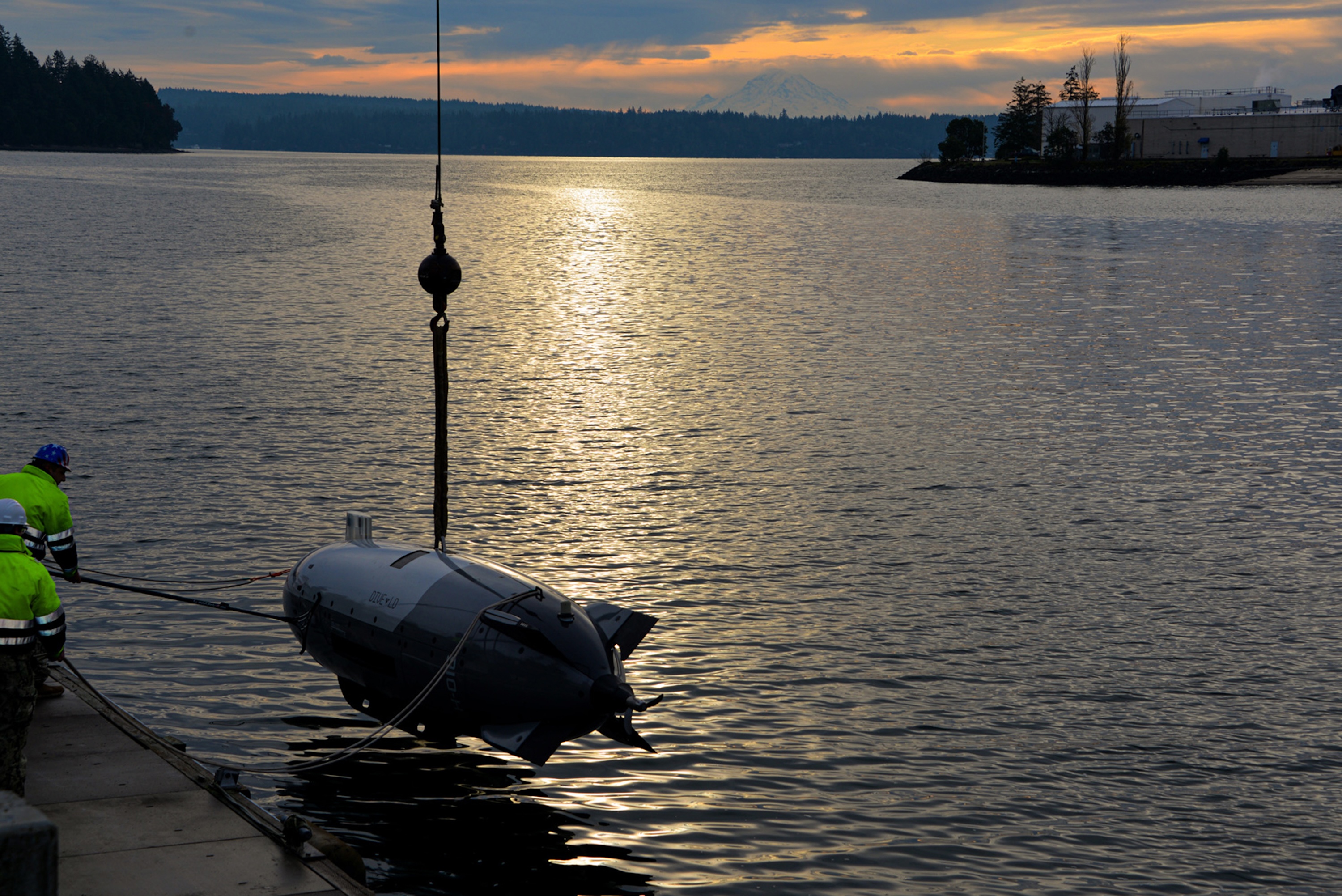 Sailors conduct training with the U.S. Navy’s newest Large Unmanned Undersea Vehicle, the Anduril Dive-LD, in Keyport, Washington, on Dec. 11, 2024. (Loren Nichols/U.S. Navy)