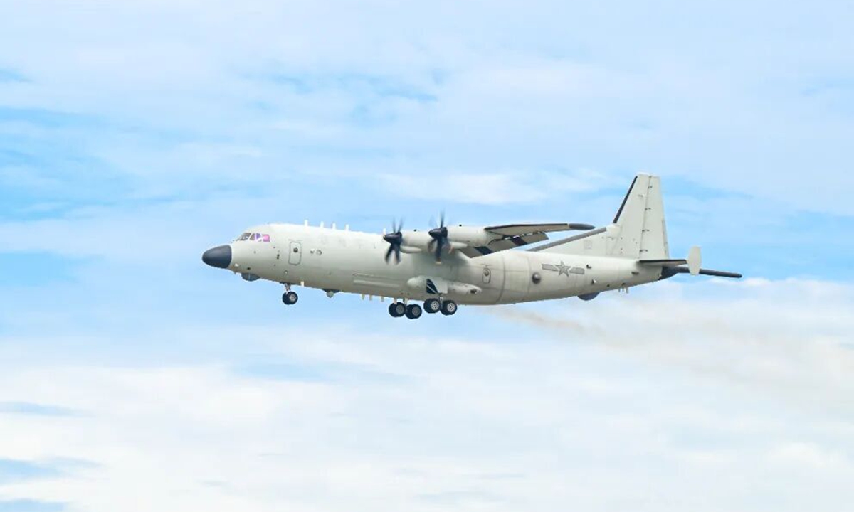 Chinese Shaanxi Y-9 maritime patrol aircraft flying over the sea