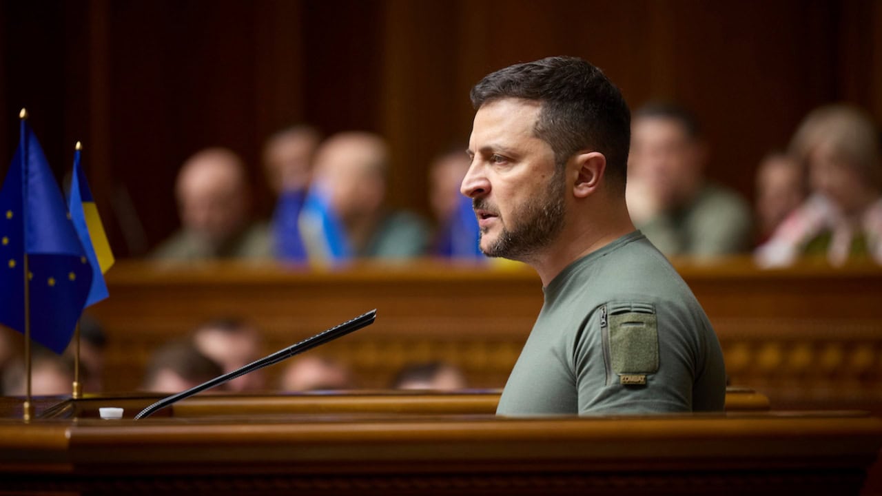 President Zelenskyy addresses Ukraine parliament with EU and Ukrainian flags