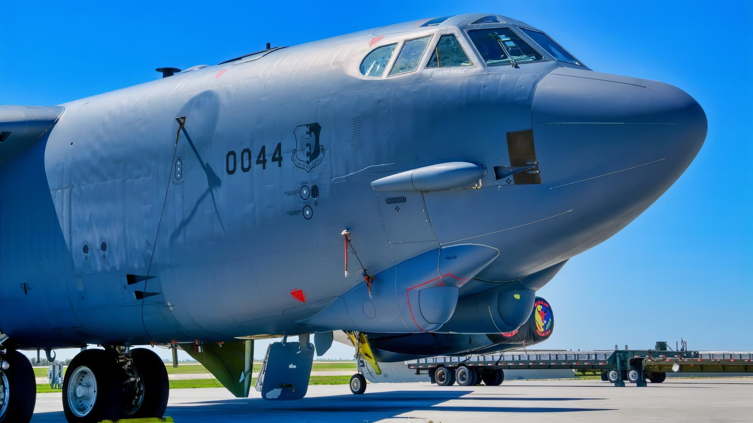 A B-52H Stratofortress sit parked on the flight line at Minot Air Force Base, North Dakota, Aug. 8, 2022. The B-52 is capable of dropping or launching gravity bombs, cluster bombs, precision-guided missiles and joint direct attack munitions. (U.S. Air Force photo by Airman Alysa Knott)