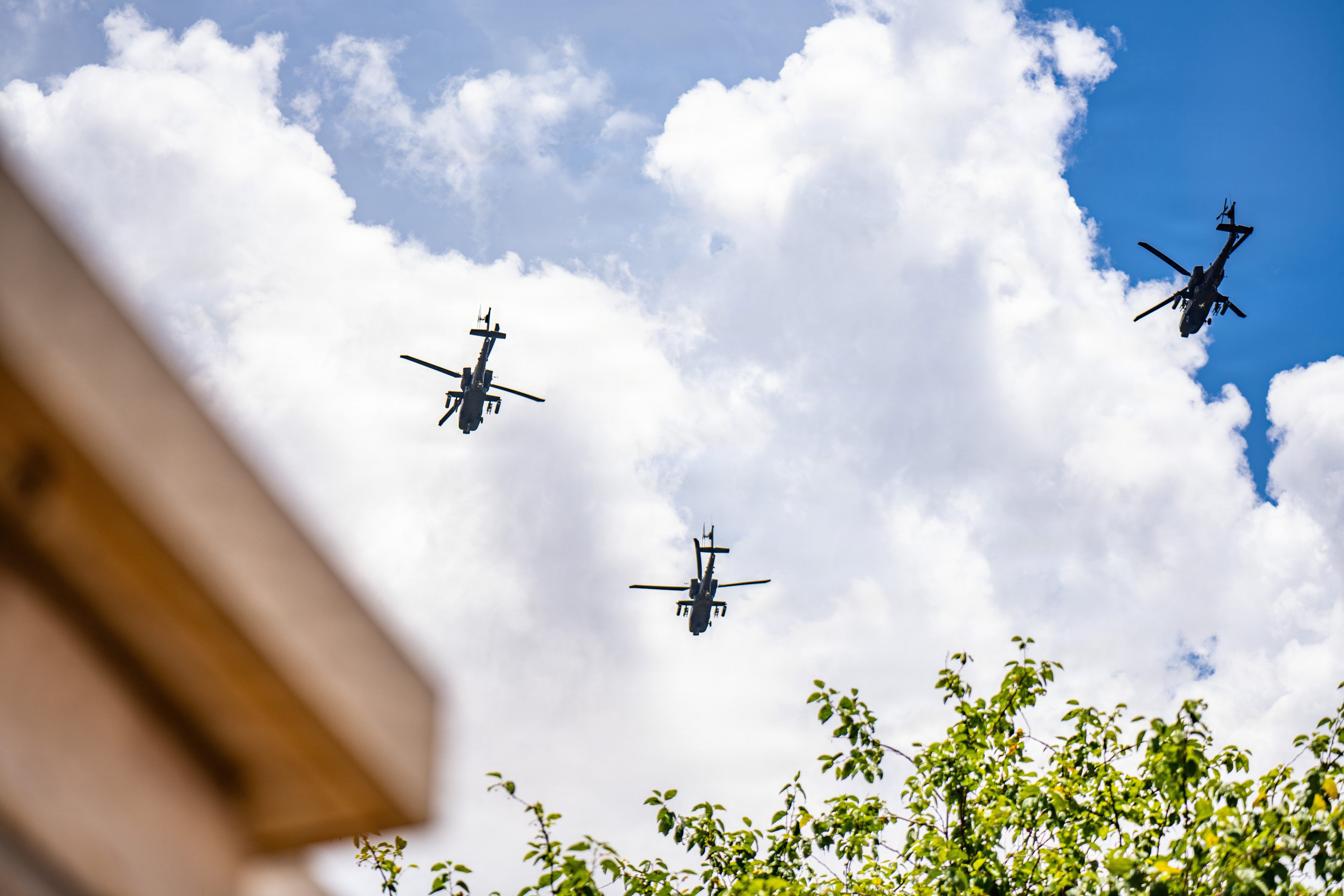 U.S. Army AH-64 Apache attack helicopters assigned to the 101st Combat Aviation Brigade conduct a funeral flyover in Clarksville, Tennessee. The Apache flyover is a solemn military tribute rendered by fellow Soldiers and aviators. (U.S. Army photo by Staff Sgt. Vincent Levelev)